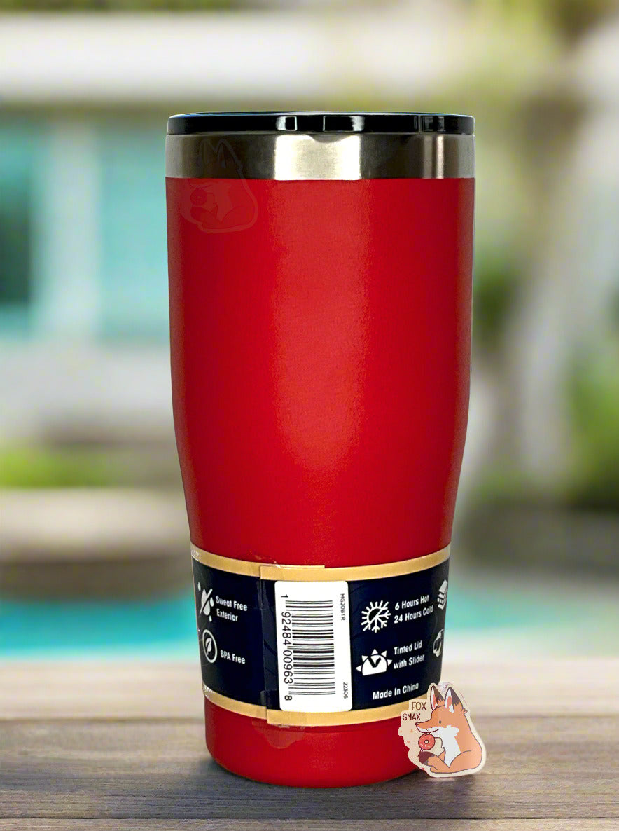 A picture of the back of a tall, red tumbler. The surface is smooth and red, as it is red paint covering stainless steel. The handle and top are plastic. The top of the mug is lined with a stainless steel band. A paper wrapper around the bottom has a diagram that reads 20 oz, next to the barcode.