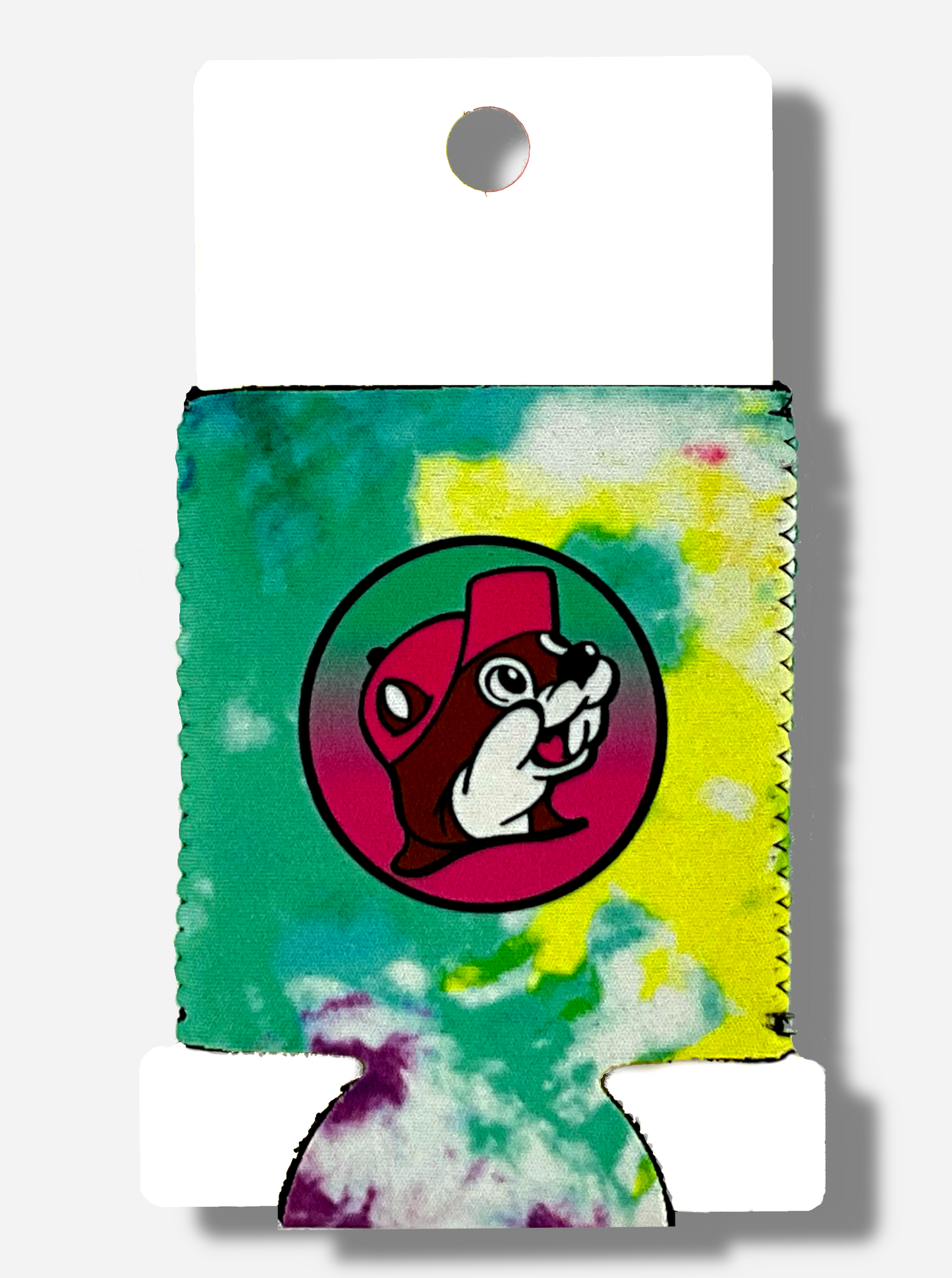 A picture of a foam and cloth tie dye Beverage Insulator, wrapped around a white piece of cardboard. The back of the tie dye insulator is the same as the front, and has a picture of Buc-ee The Beaver on it, sillhoutted against a yellow circle with a black outline.