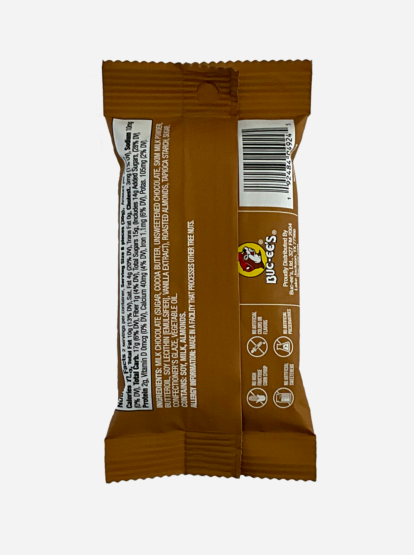 A picture of the back of a small package of Buc-ee's Milk Chocolate Almonds, 2 oz. The bag is light brown.