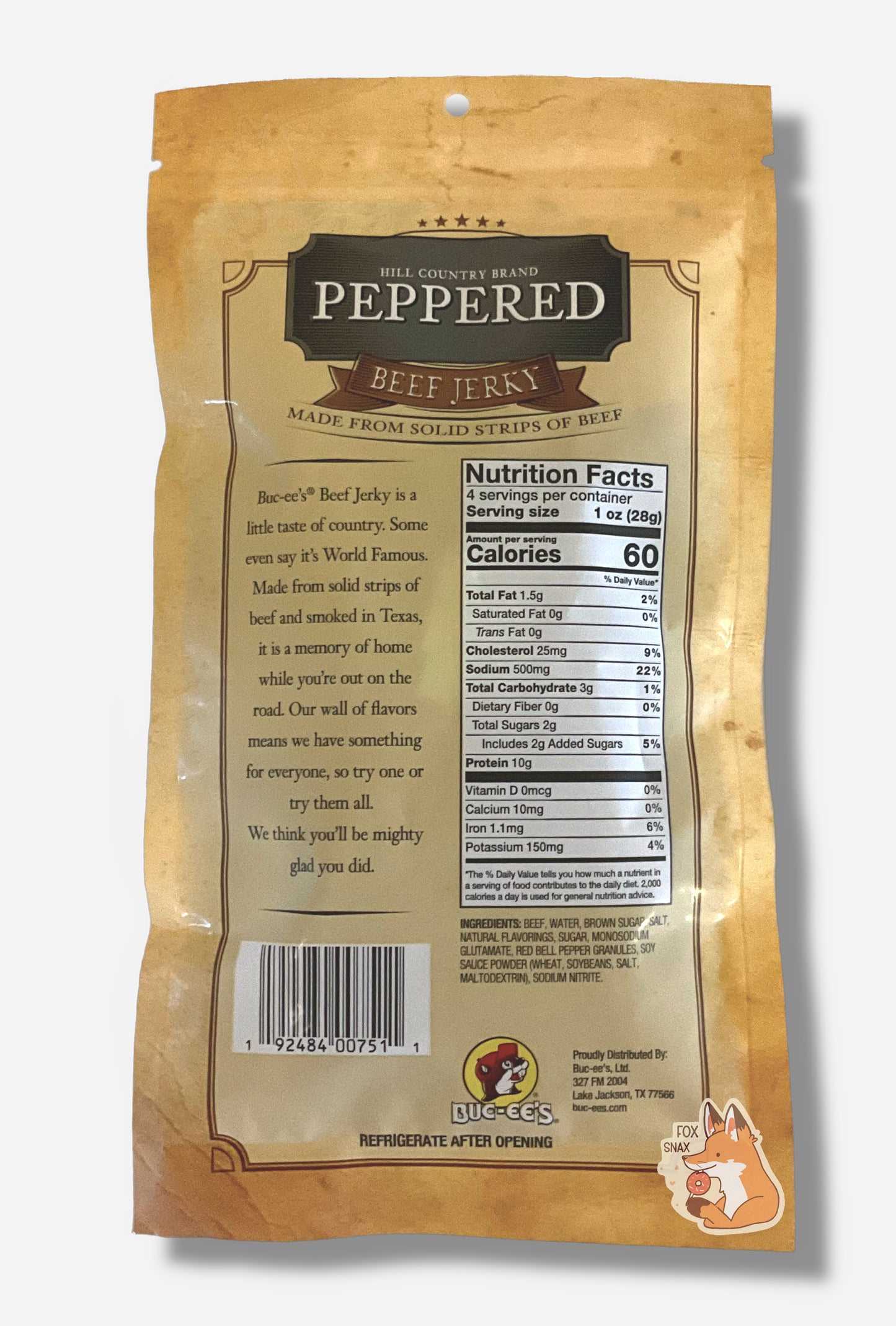 A picture of the back of a tan plastic bag of Buc-ee's Hill Country Brand Peppered Beef Jerky. The label underneath reads 'Buc-ee's Beef Jerky is a little taste of country. Some even say it's World Famous. Made from solid strips of beef and smoked in Texas, it is a memory of home while you're out on the road. Our wall of flavors means we have something for everyone, so try one or try them all. We think you'll be mighty glad you did.'