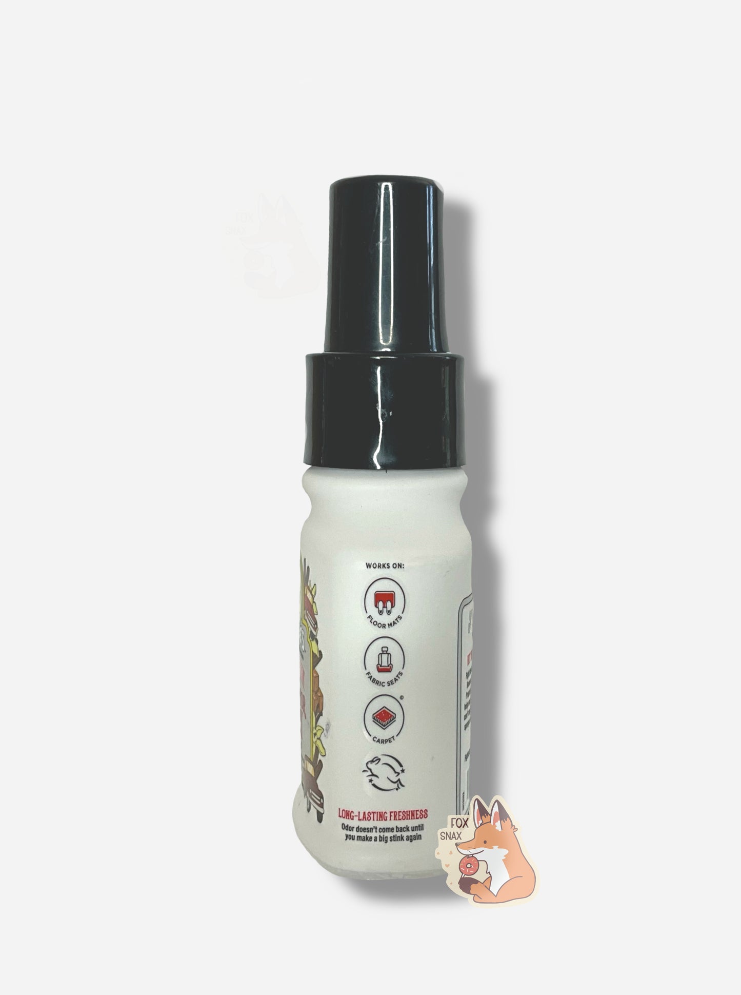Left side of a white bottle of Buc-ee's car odor spray on a white background. The label reads: Works on Floor Mats, Fabric Seats, Carpet. Long lastng freshness, Odor doesn't come back until you make a big stink again