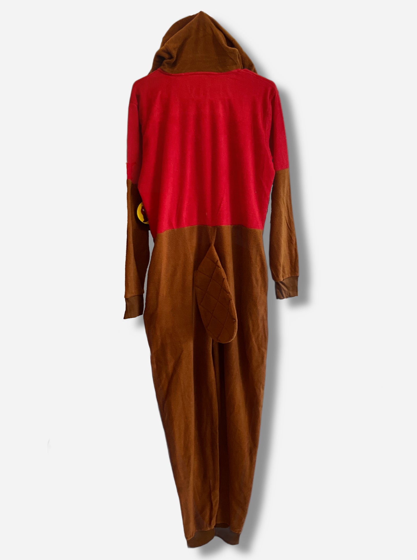 A picture of the back of a large onesie that resembles Buc-ee The Beaver. The hood is Buc-ee's beaver head. The back of the hood is brown "fur" cloth, the back is the red Buc-ee's t-shirt, and a large cloth beaver tail pokes out of the back of the rump.