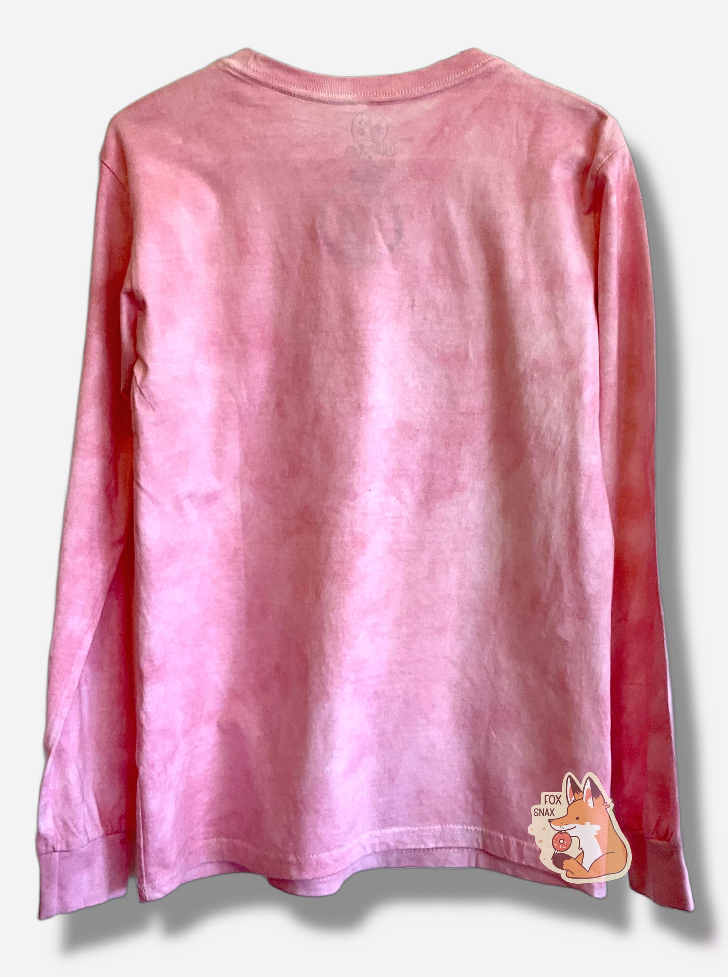 A picture the back of a pink sorta-tie dyed long sleeve shirt.