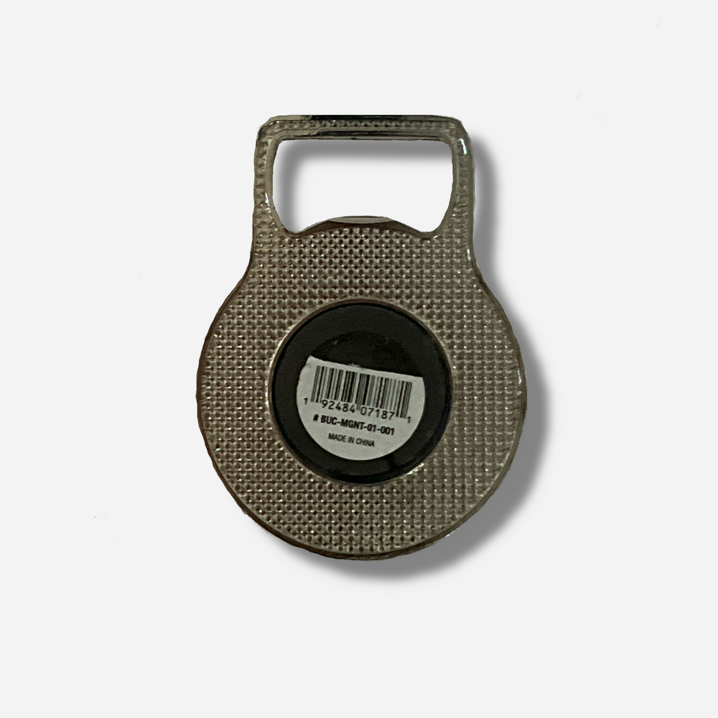 A picture of the back of a metallic bottle opener. The top of the opener is a grey metal and shaped to open bottles. The bottom of the opener has a large circle magnet on it.