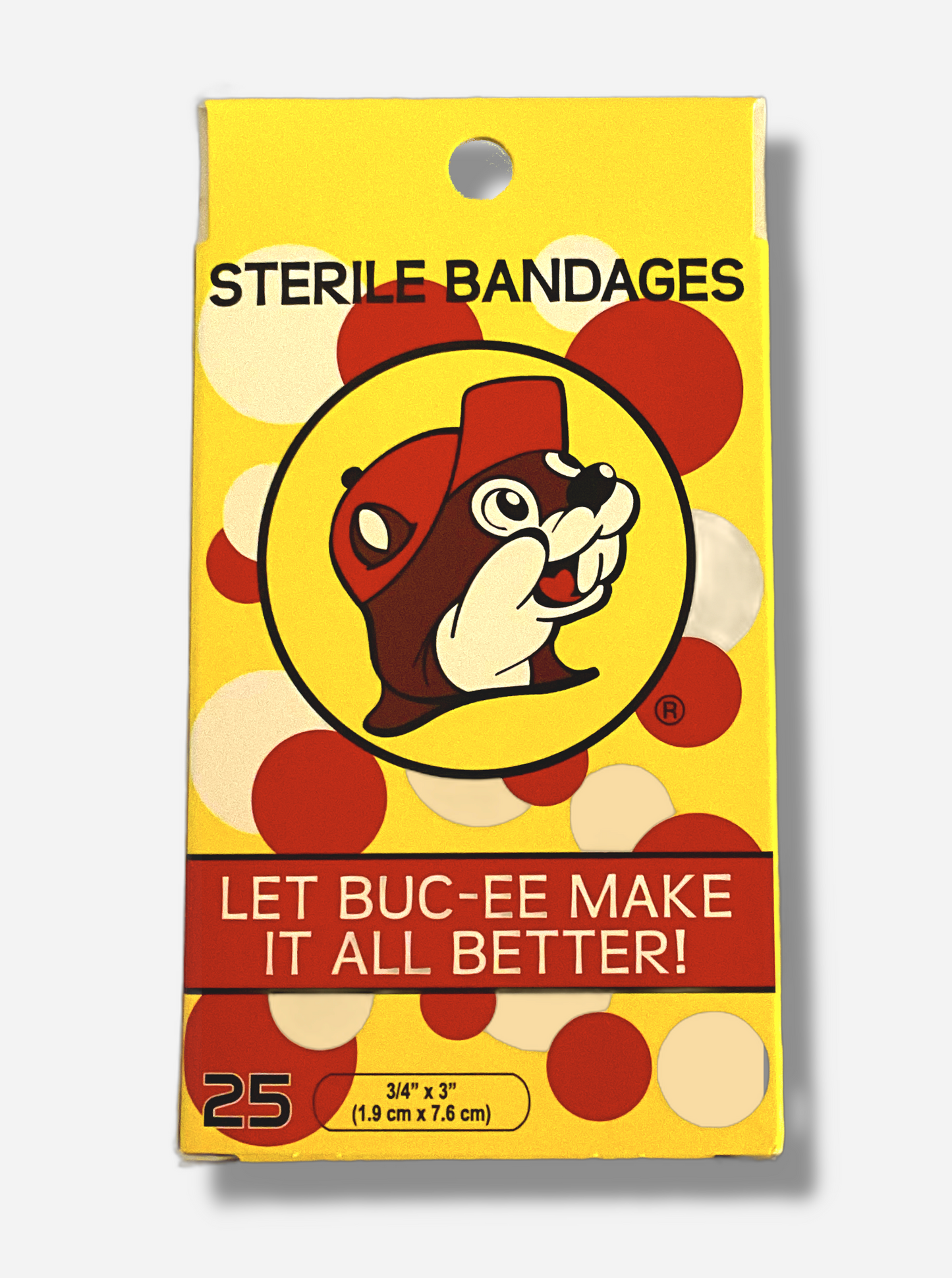 A picture of the back of a package of Buc-ee's Sterile Bandages. The front of the package is spotted with red and white spots against a yellow background, and reads LET BUC-EE MAKE IT ALL BETTER! 25 bandages, 3/4" x 3" inches. The Buc-ee's logo - a jolly beaver with a red hat - is prominently displayed on the back.