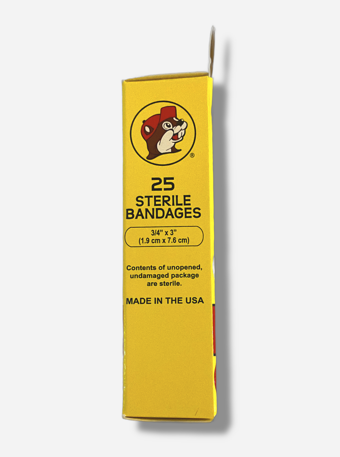 A picture of the side of a package of bandages. It reads: 25 Sterile Bandages. 3/4" x 3". Contents of unopened, undamaged package are sterile. Made in the USA