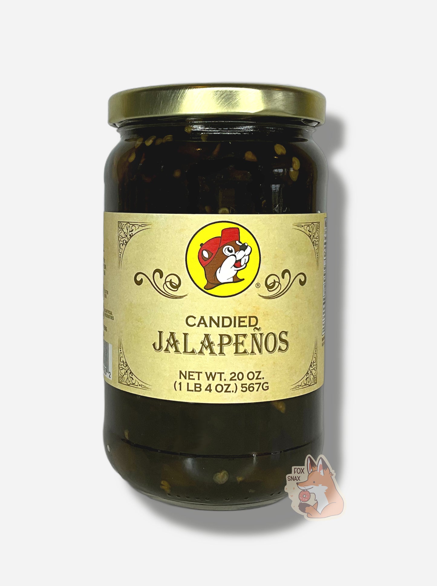 A picture of the front of a glass jar of Buc-ee's Candied Jalapeños - the label is a "old-timey" sort of white/yellow with flared edges. The middle has a giant Buc-ee the Beaver logo on it. In the jar, dark green jalapeños can be seen.