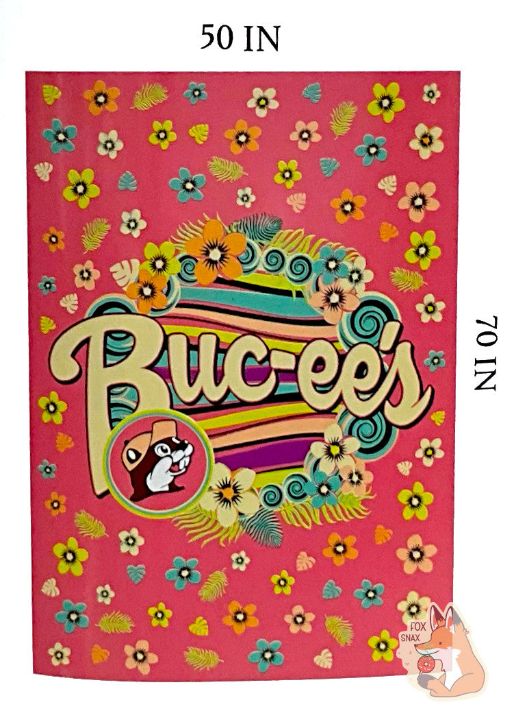 A closeup on the paper label surrounding the blanket reads BUC-EE'S BLANKET *SOFT AND COMFY* 50 IN x 70 IN