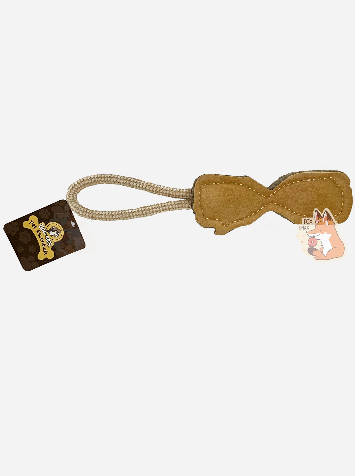 A close up picture the back of a Buc-ee's "Pet Essentials" Log Rope dog toy. The body of the toy is shaped like a log - roughly - with a flat body and a dip in the middle, presumably to make it easier for a dog to bite it. On one end is a strong tan rope. The body of the tool is tan, Both ends of the rope are tied into one end of the "log", making a loop for a person to hold on to.