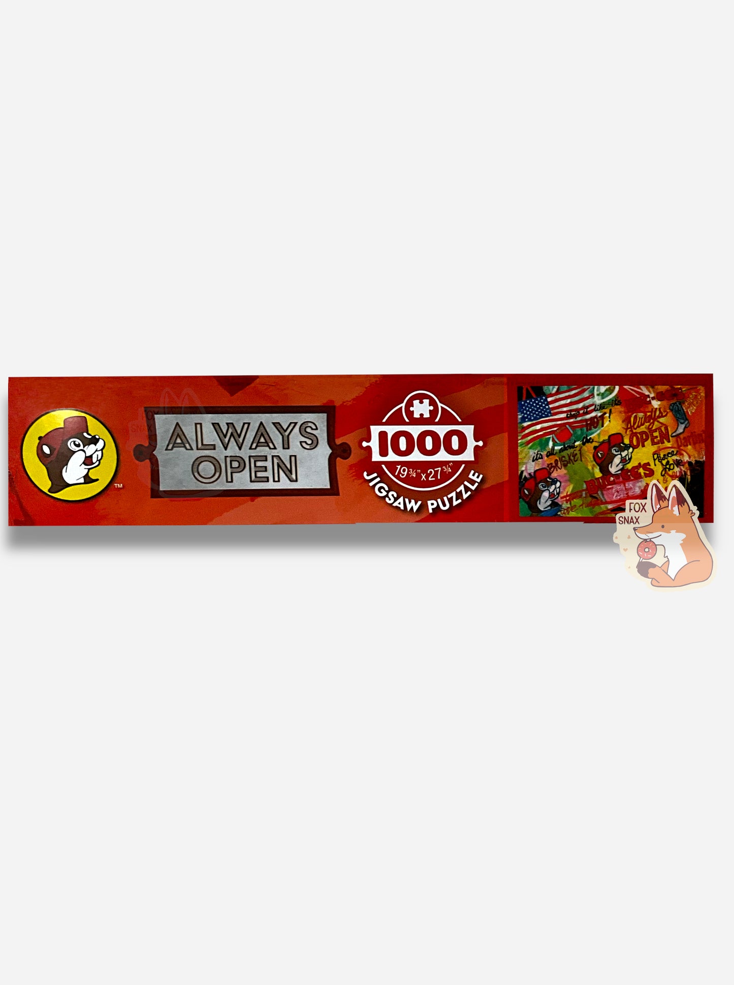A picture of the side of a box of an extremely colorful puzzle. The side has a Buc-ee's logo, then the text ALWAYS OPEN, then 1000 (pieces), 19 3/4 x 27 3/4. A smaller version of the puzzle itself is shown on the side here, same as the front of the box.