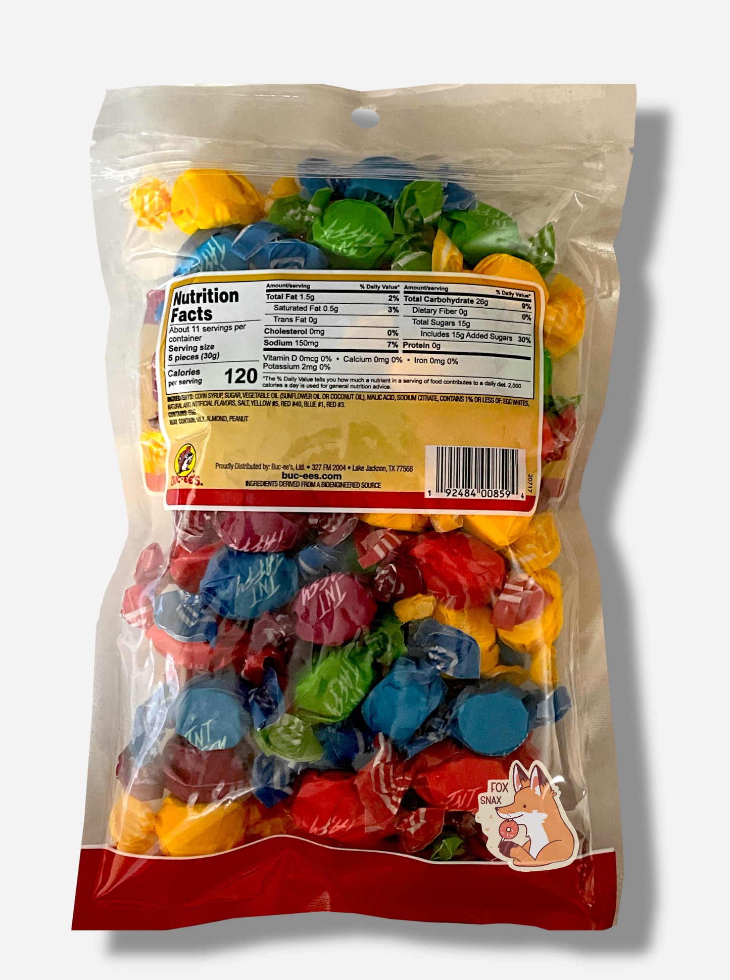 A picture of the back of a plastic bag of Buc-ee's Sour Salt Water Taffy. The bag is clear plastic. Inside it, twists of candy in five different wrapping colors (red, yellow, green, purple) can be seen.