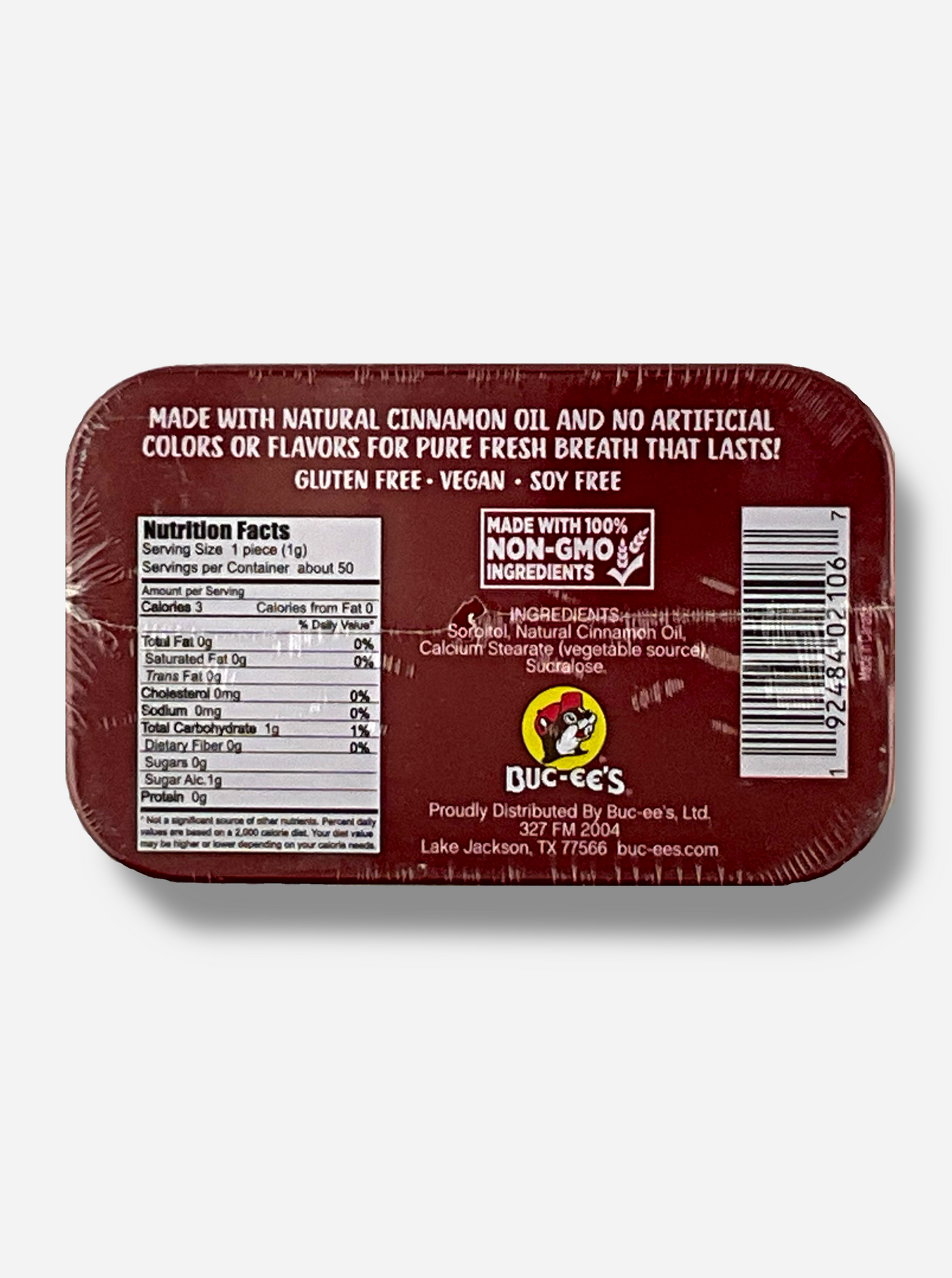 A picture of a back of a tin of Buc-ees Cinnamon Mints. The back cover is decorated with a small picture of Buc-ee The Beaver, and has the following text: Made With Natural Cinnamon Oil And No Artificial Colors Or Flavors For Pure Fresh Breath That Lasts!, Gluten Free, Vegan, Soy Free, made with 100% Non-GMO Ingredients.
