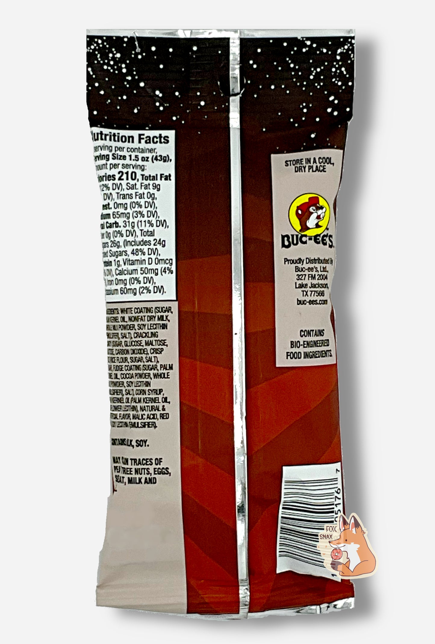 A picture of the back of a bag of Buc-ee's Cosmic Pops, in Cherry Cola flavor. The back of the bag reads STORE IN A COOL, DRY PLACE, then shows a picture of the Buc-ee's beaver logo, then CONTAINS BIO-ENGINEERED FOOD INGREDIENTS.