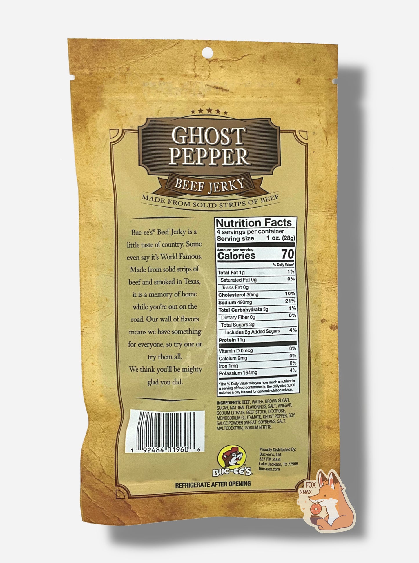 A picture of the back of a tan plastic bag of Buc-ee's Ghost Pepper Beef Jerky. The label underneath reads 'Buc-ee's Beef Jerky is a little taste of country. Some even say it's World Famous. Made from solid strips of beef and smoked in Texas, it is a memory of home while you're out on the road. Our wall of flavors means we have something for everyone, so try one or try them all. We think you'll be mighty glad you did.'