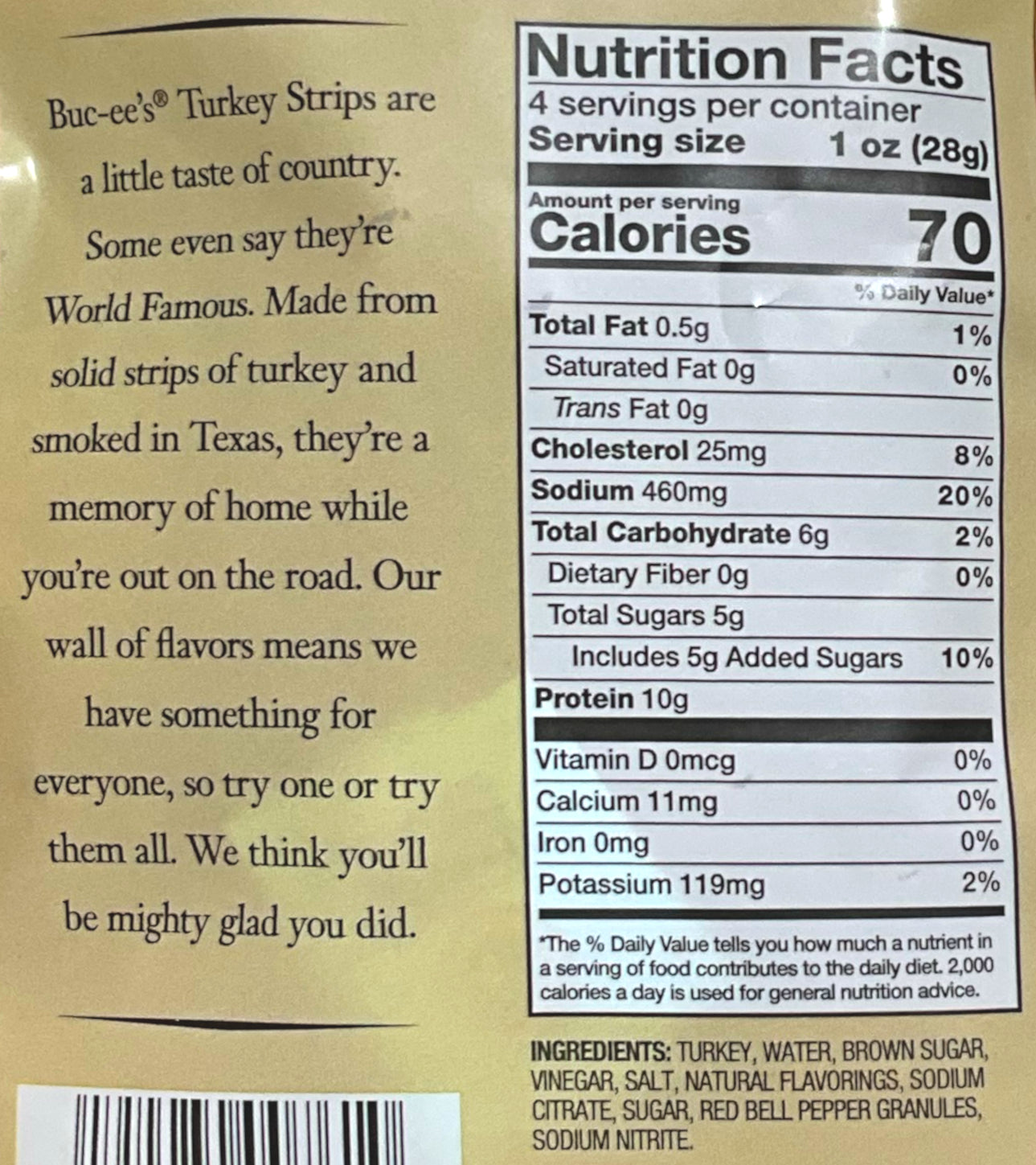 A closeup of the back of a bag of Buc-ee's Hill Country Brand Peppered Turkey Strips. The label underneath reads 'Buc-ee's Turkey Strips are a little taste of country. Some even say it's World Famous. Made from solid strips of turkey and smoked in Texas, it is a memory of home while you're out on the road. Our wall of flavors means we have something for everyone, so try one or try them all. We think you'll be mighty glad you did.' Nutrition facts are listed below, then ingredients.