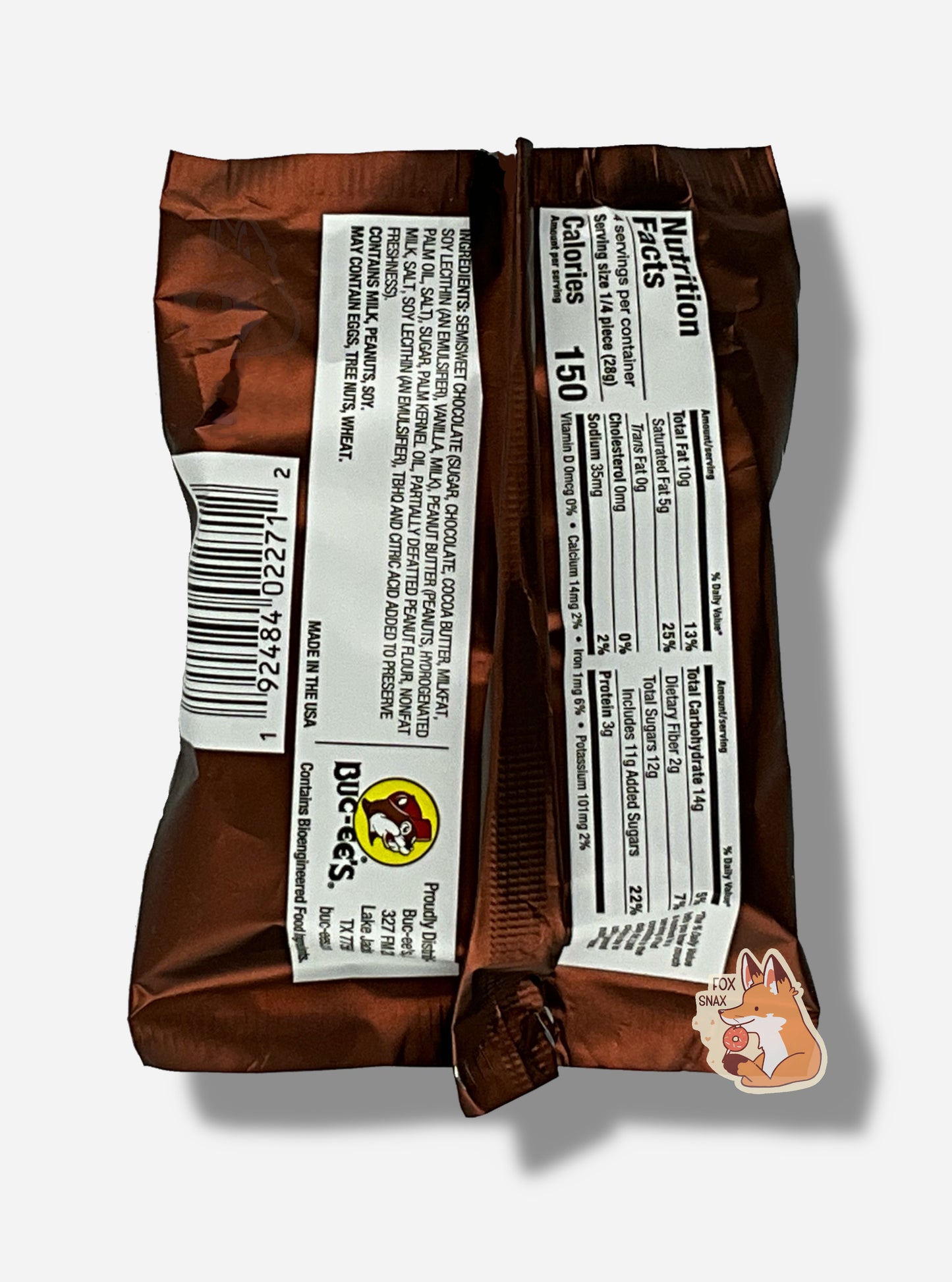 A picture of the back of a package of a dark chocolate peanut butter Buc-ee's OverBite. The package is metallic and dark brown, and has a small picture of the Buc-ee's logo on the back.