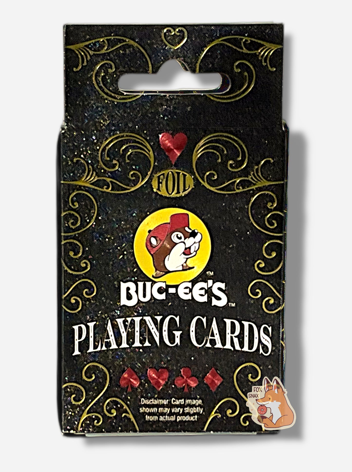 A picture of the back of pack of Buc-ee's Foil Playing Cards. The pack is paper, black, with gold sparkles. The center reads FOIL in gold foil, then the Buc-ee's logo, then BUC-EE'S PLAYING CARDS. A disclaimer is shown at the bottom, and reads Card image shown may vary slightly from actual product.