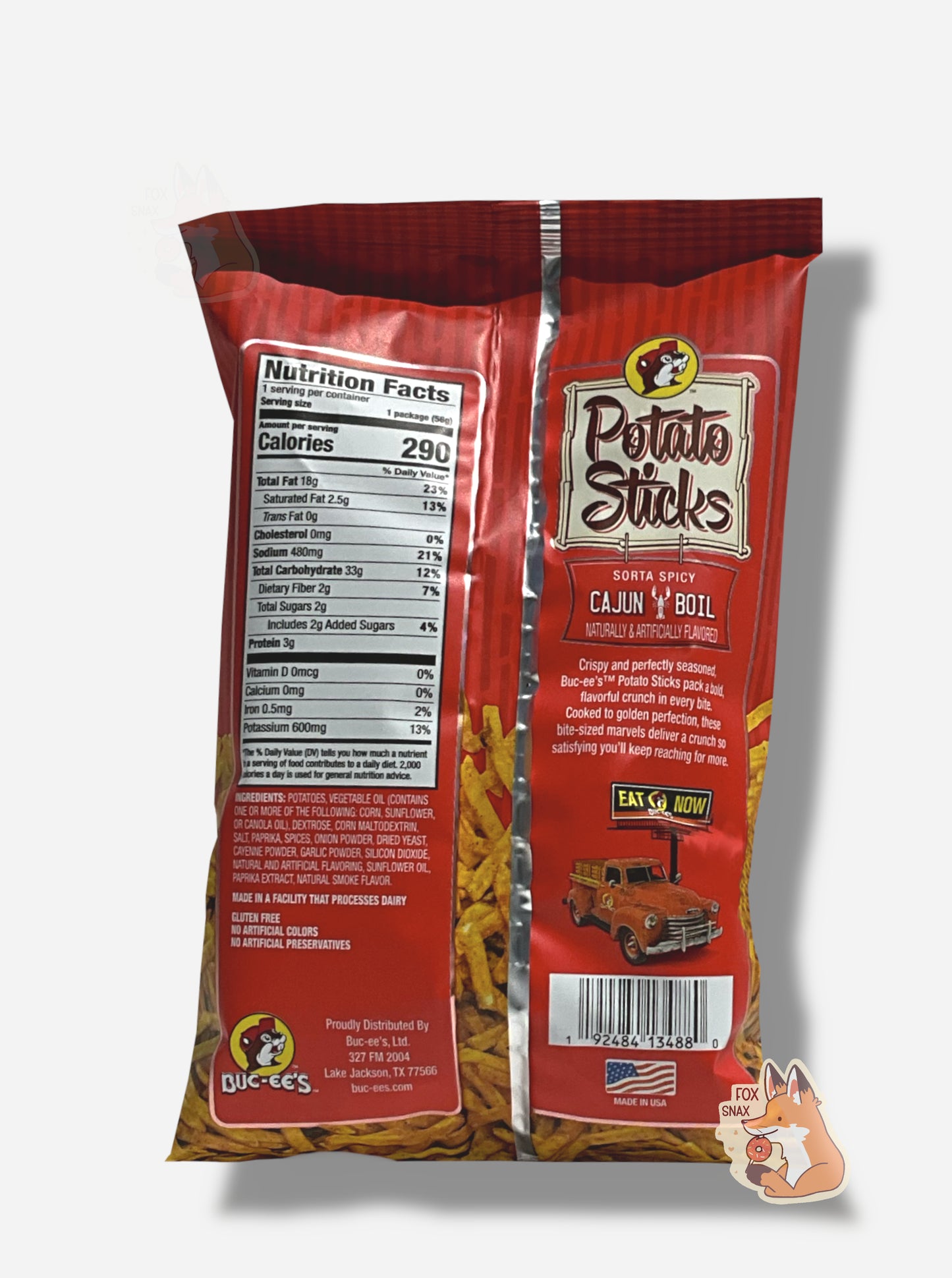 The back of a bag of Buc-ee's Sorta Spicy Cajun Boil Potato Sticks. The bag is in dark red and red. Ingredients are listed, next to text that reads CRISPY AND PERFECTLY SEASONED, BUC-EE'S POTATO STICKS PACK A BOLD, FLAVORFUL CRUNCH IN EVERY BITE. COOKED TO GOLDEN PERFECTION, THESE BITE-SIZED MARVELS DELIVER A CRUNCH SO SATISFYING YOU'LL KEEP REACHING FOR MORE.