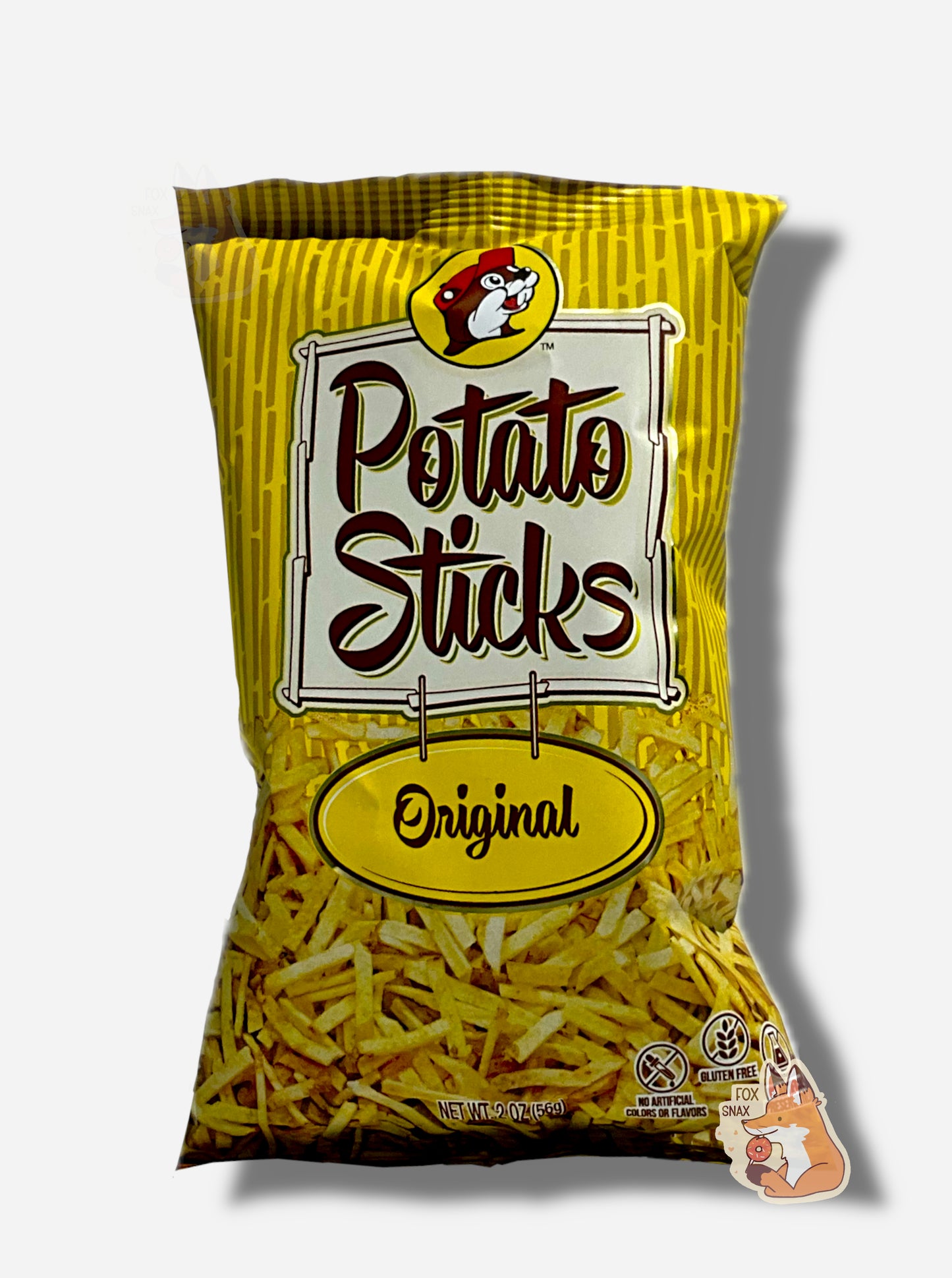 A bag of Buc-ee's Original Potato Sticks. The bag is in dark and light yellow, and has a white sign in the middle in black text that reads POTATO STICKS, then under that, ORIGINAL. A large number of skinny (skinnier than french fries) potato sticks frame the bottom of the bag.