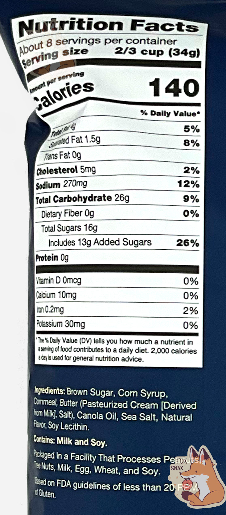 A closeup  back of a opaque, dark blue and white bag of Buc-ee's Sea Salted Caramel Beaver Nuggets.    Nutrition facts and ingredients can be seen.