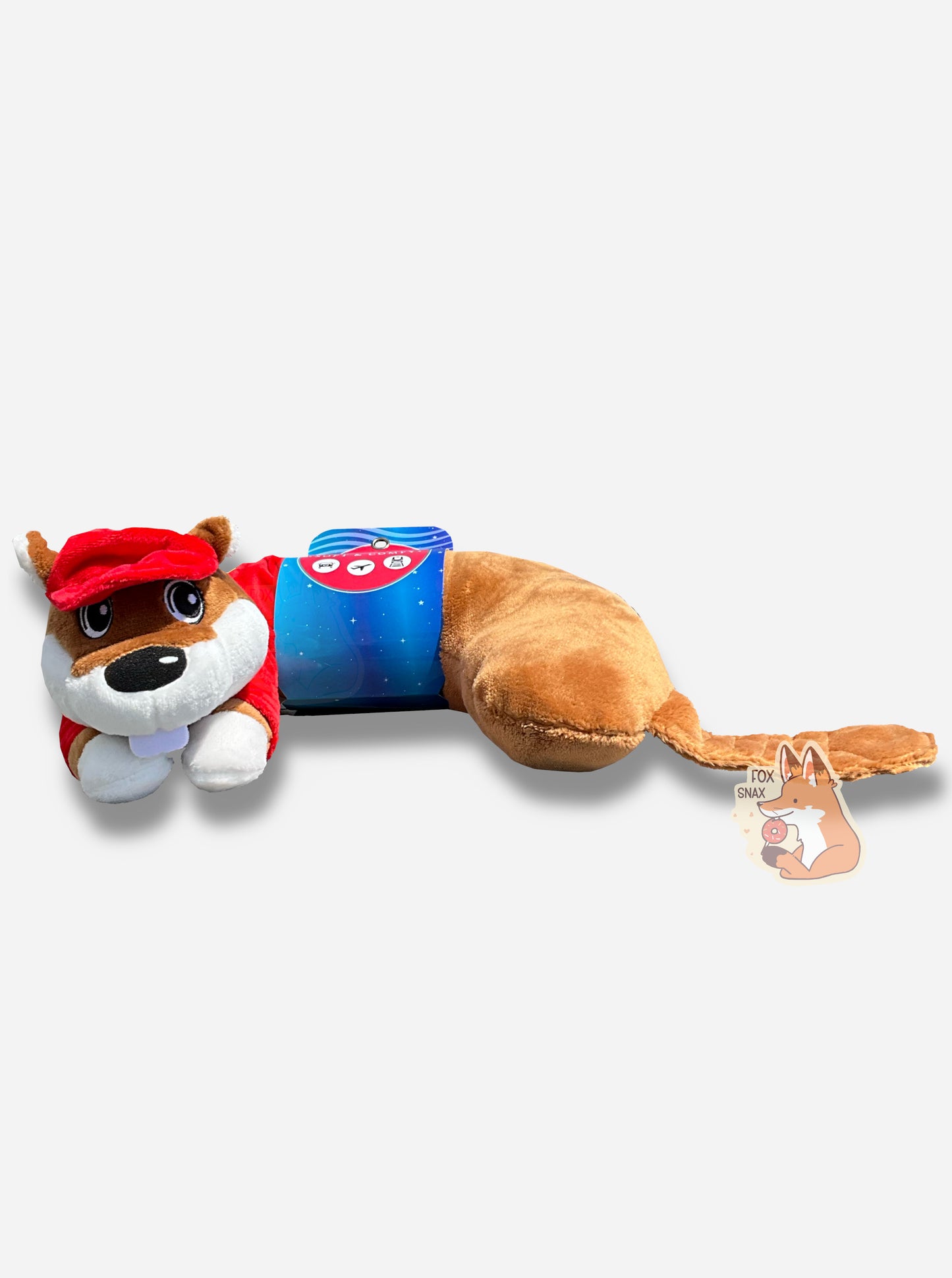 A picture of the side of a mostly u-shaped, travel pal pillow. It is is shaped roughly like Buc-ee the Beaver. Buc-ee is wearing a red ball cap, a red Buc-ee's shirt complete with Buc-ee logo, and sports a brown beaver tail. A dark blue paper label is shown around his midsection.