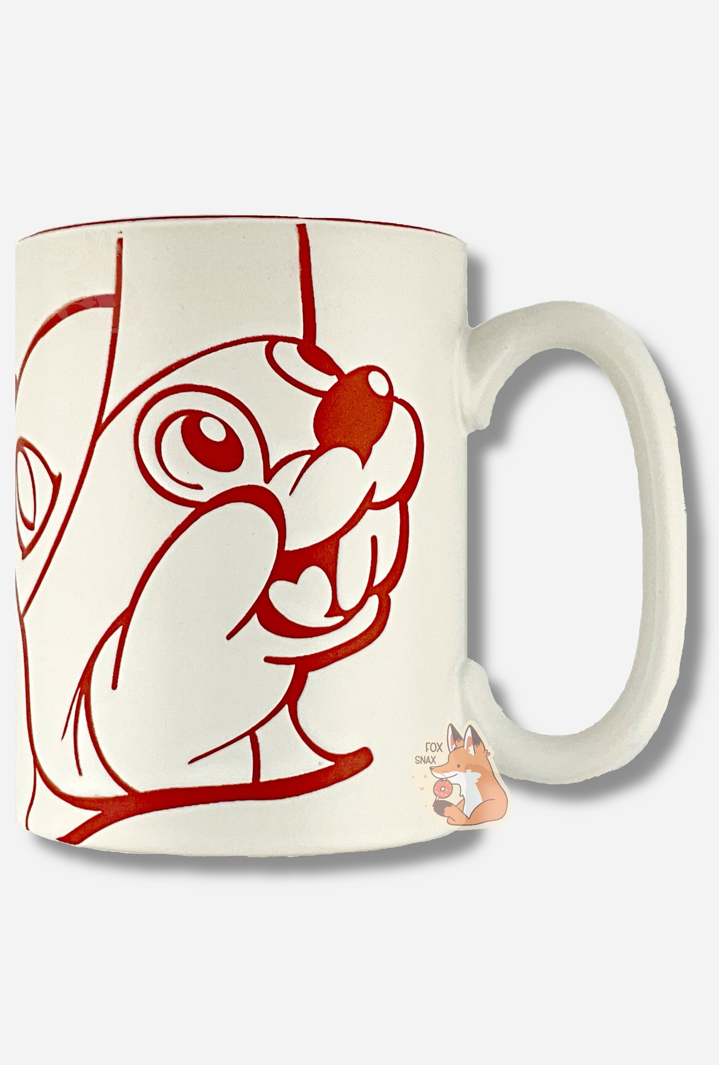 A picture of a ceramic, red and white coffee mug. The mug prominently features a picture of Buc-ee The Beaver on the front and back, in red. The interior of the mug is a bright red as well, and rest of the mug is white.
