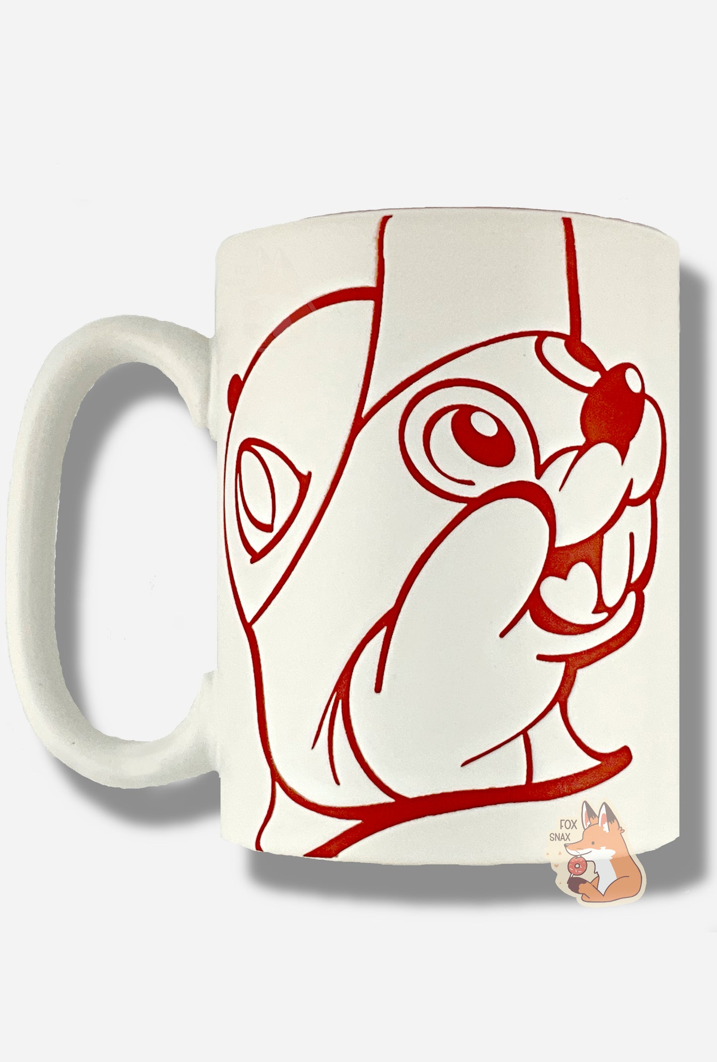 A picture of a ceramic, red and white coffee mug. The mug prominently features a picture of Buc-ee The Beaver on the front and back, in red. The interior of the mug is a bright red as well, and rest of the mug is white.
