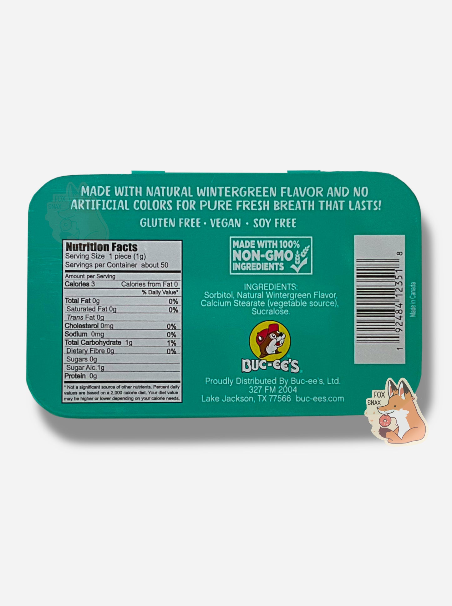 A picture of a back of a tin of Buc-ees Wintergreen Mints. The back cover is decorated with a small picture of Buc-ee The Beaver, and has the following text: Made With Natural Wintergreen Flavor And No Artificial Colors Or Flavors For Pure Fresh Breath That Lasts!, Gluten Free, Vegan, Soy Free, made with 100% Non-GMO Ingredients.