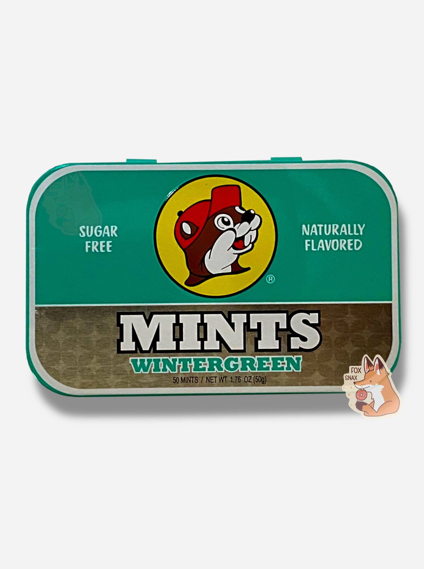 A picture of a tin of Buc-ees Wintergreen Mints. The cover is decorated with a big picture of Buc-ee The Beaver, and has a green and gold background. The tin reads Sugar Free, Naturally Flavored, Mints, Wintergreen.