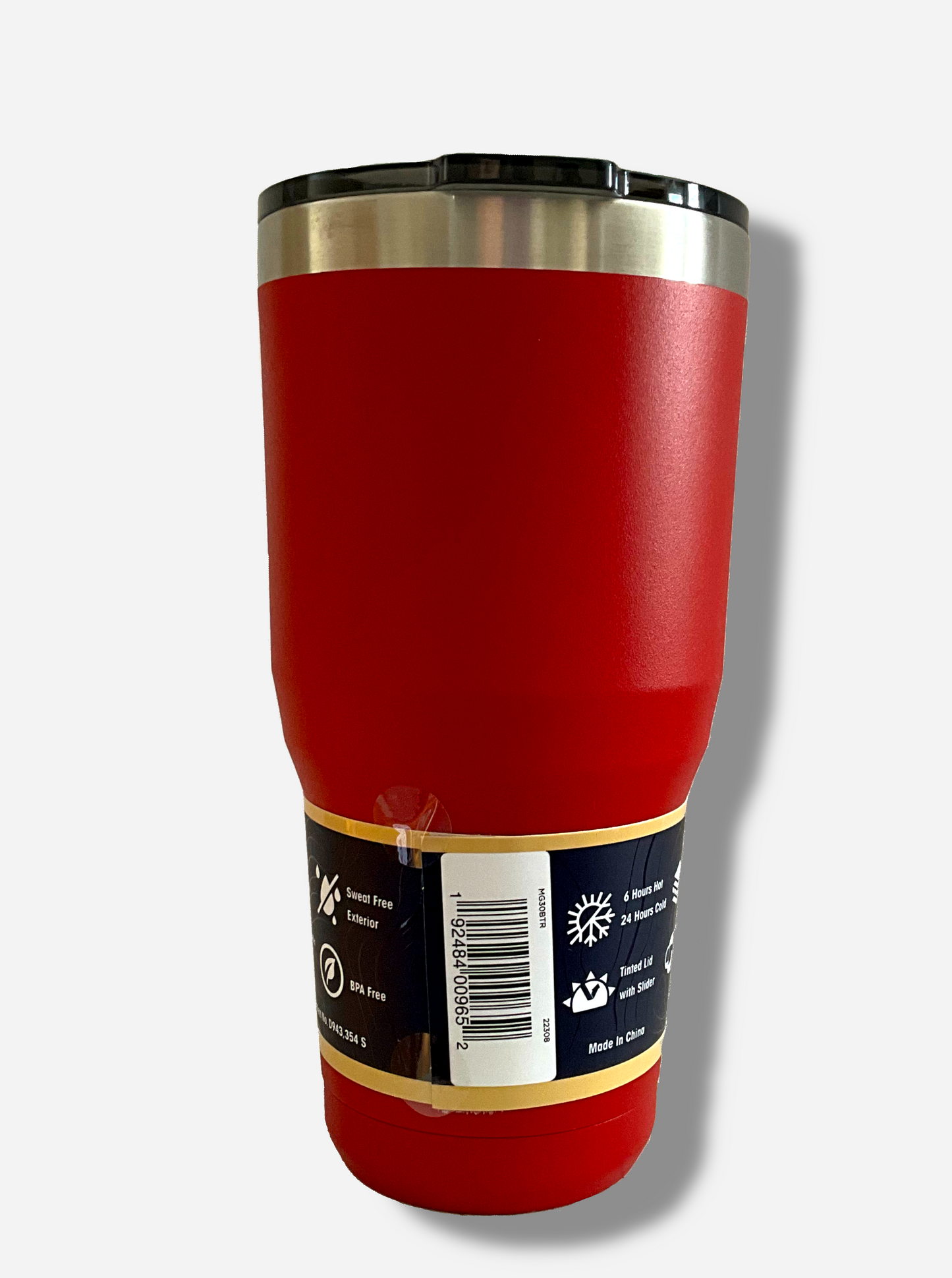 A picture of the back of a tall, red tumbler.  The surface is smooth and red, as it is red paint covering stainless steel.  The top is black plastic.  The top of the mug is lined with a stainless steel band.  A paper wrapper around the bottom has a diagram that reads 30 oz, next to the barcode.