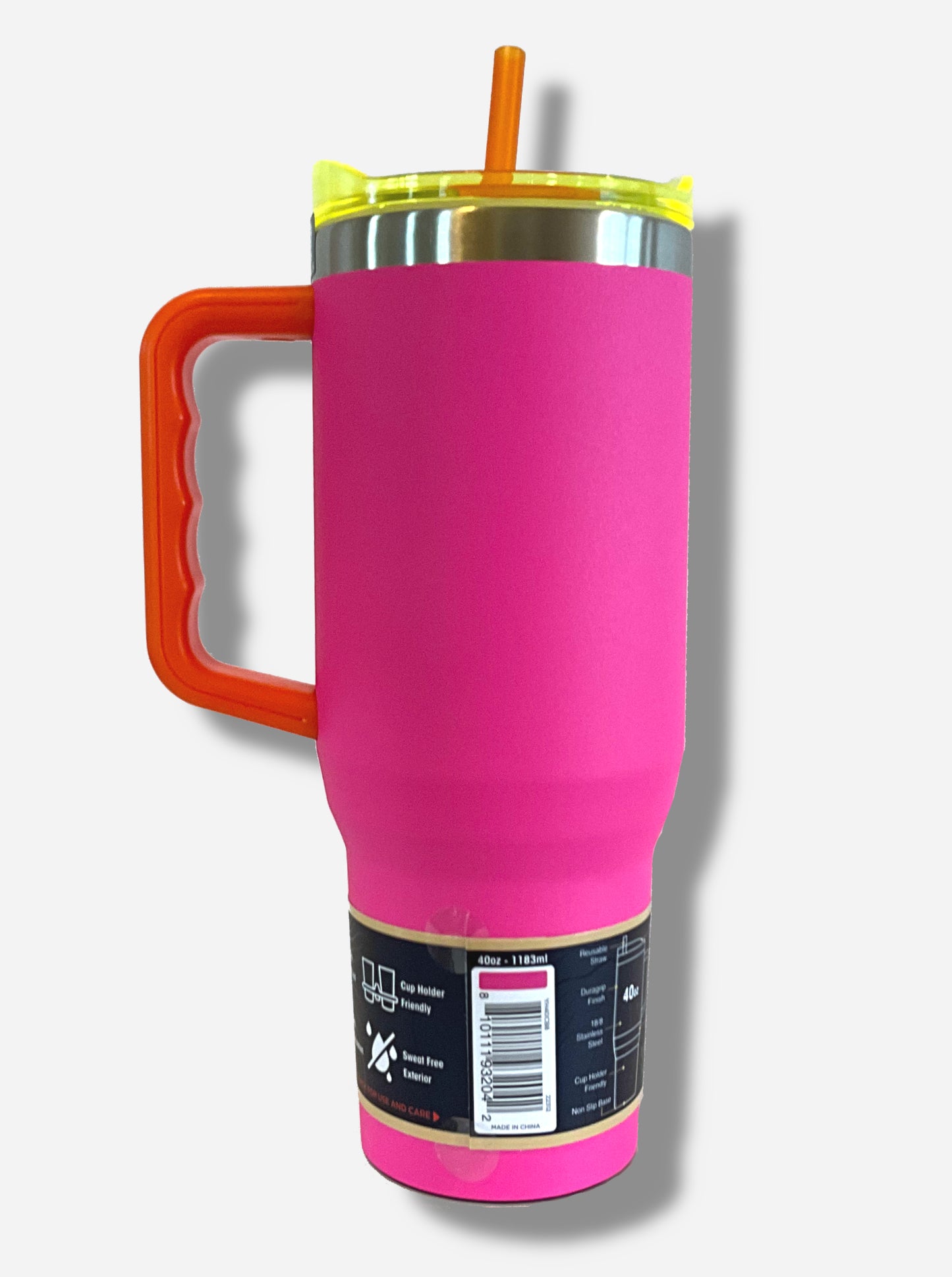 A picture of the back of a tall, pink, sorta skinny tumbler, with a orange plastic handle and transparent yellow top.  The surface is smooth and pink-colored,as it is pink paint covering stainless steel.  The handle, top, and straw are plastic.  The top of the mug is lined with a stainless steel band.  A paper wrapper around the bottom reads: 6 hours hot, 24 Hours Cold.  Double Wall, Vacuum Insulation, Cup Holder Friendly, Sweat Free Exterior.  40 oz - 1183 ml