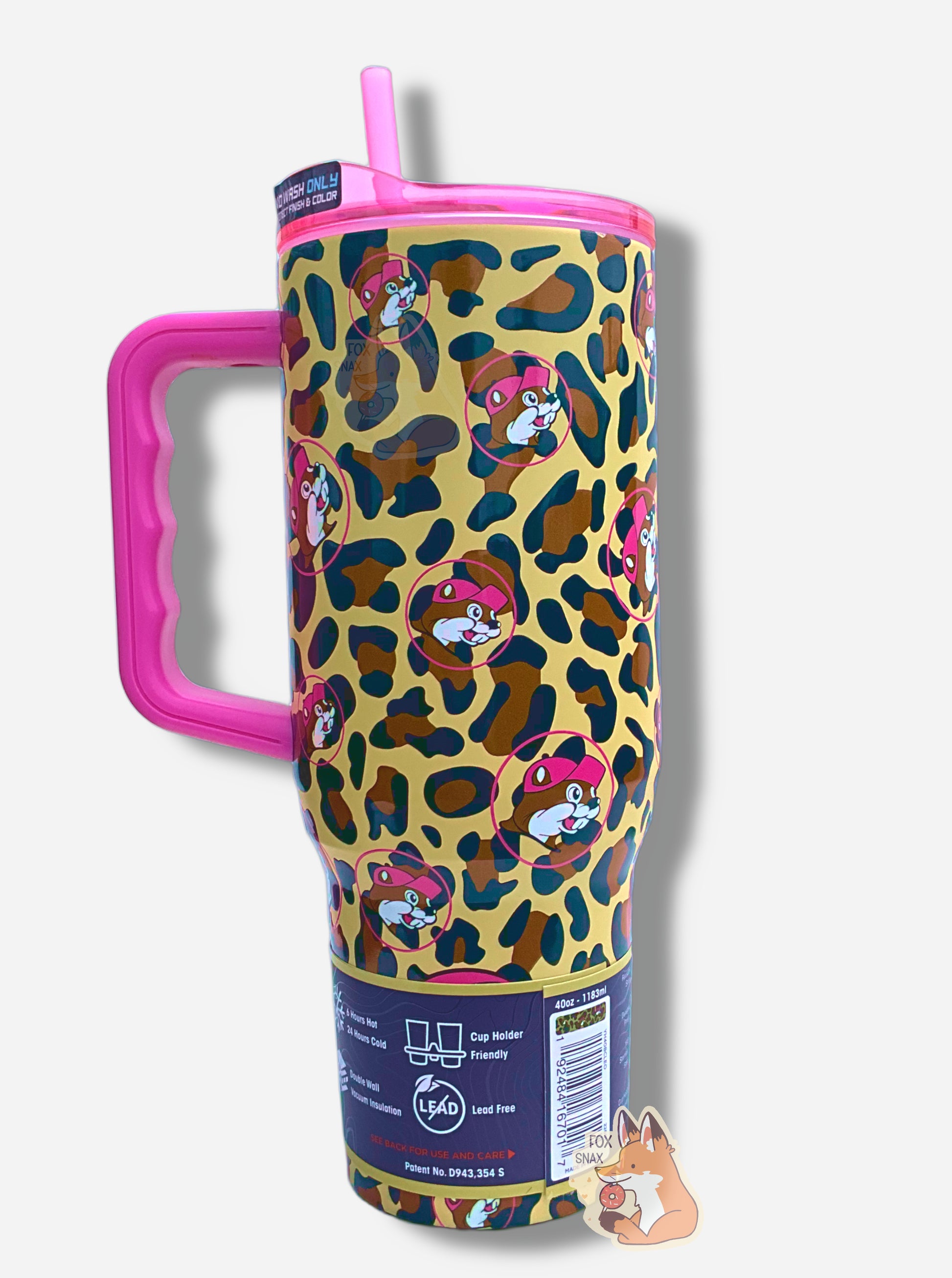 A picture of the back of a tall, gold, sorta skinny tumbler.  The surface is a leopard print, as it is matte leopard-colored paint covering stainless steel.  The handle, top, and straw are hot pink plastic.  The top of the mug is lined with a stainless steel band.  A paper wrapper around the bottom has a diagram that reads 40 oz, next to the barcode.