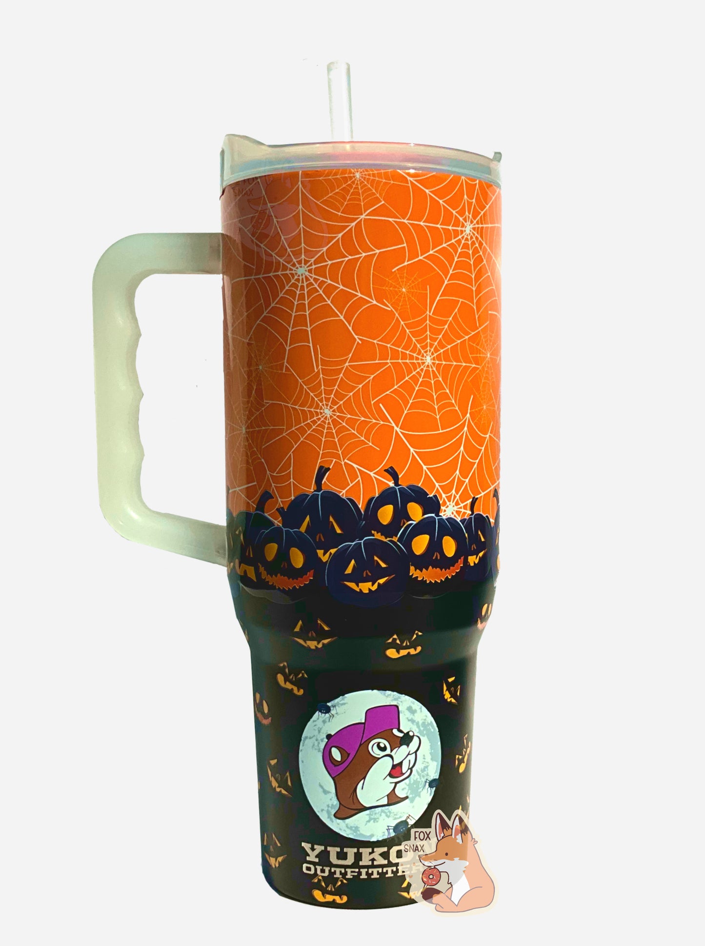 A picture of the back of a tall, orange and black, sorta skinny tumbler.  The surface is covered in glow in the dark spiderwebs, with an orange background.  Jack-o-lanterns are piled high at the bottom of the tumberl.  The handle, top, and straw are plastic.  The top of the mug is lined with a stainless steel band.  A paper wrapper around the bottom has a diagram that reads 40 oz, next to the barcode.