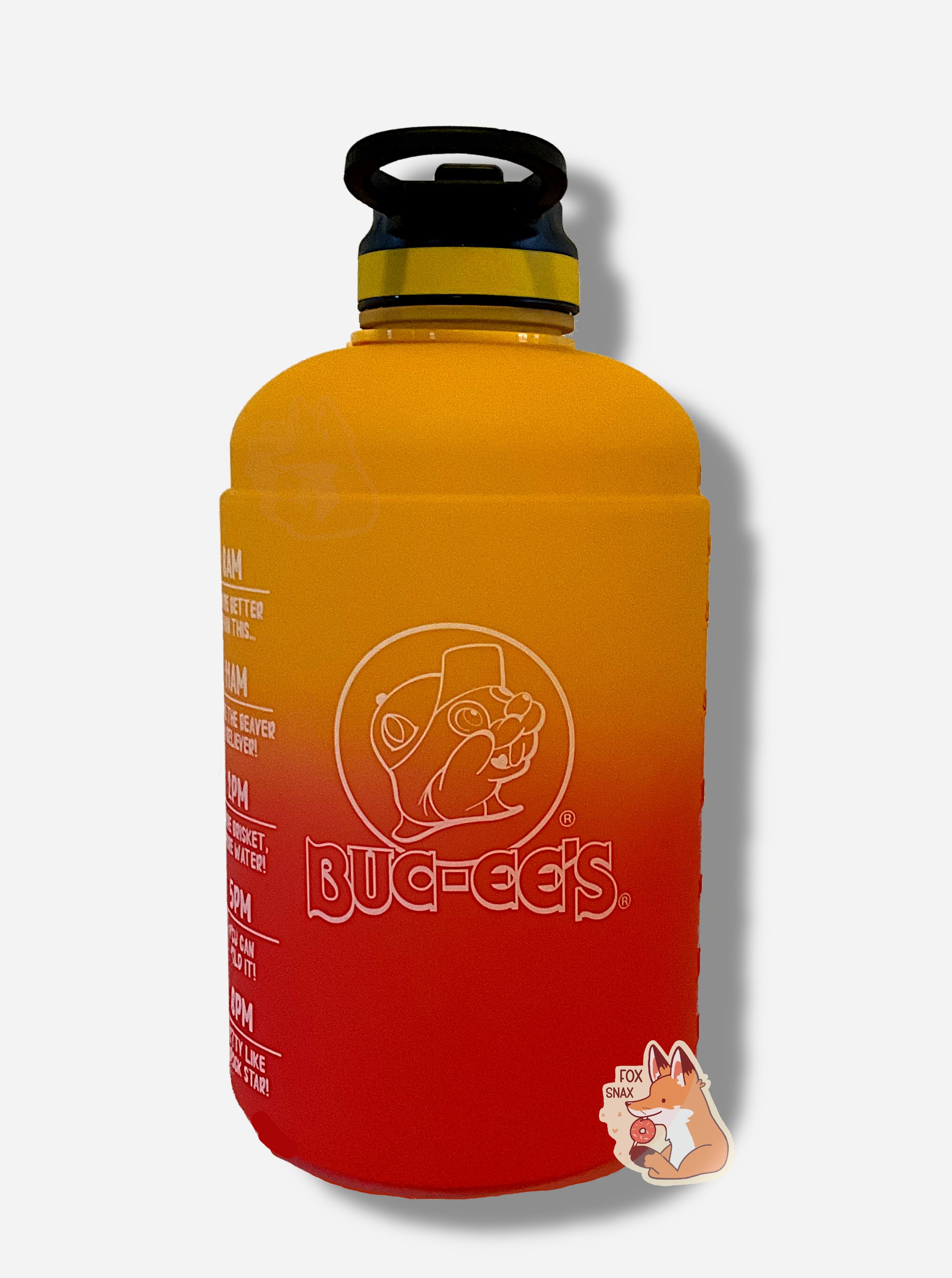 A picture of the front of a large, cylindrical hydration jug, made of plastic.  The bottom is a vibrant red, shading upward through a gradient to a brilliant gold at the top.  On the side is a white logo of Buc-ee The Beaver, wearing a ballcap, underneath him: Buc-ee's.  The top of the jug is black plastic, with a yellow band, and a flip-top straw-in-lid in black and yellow.