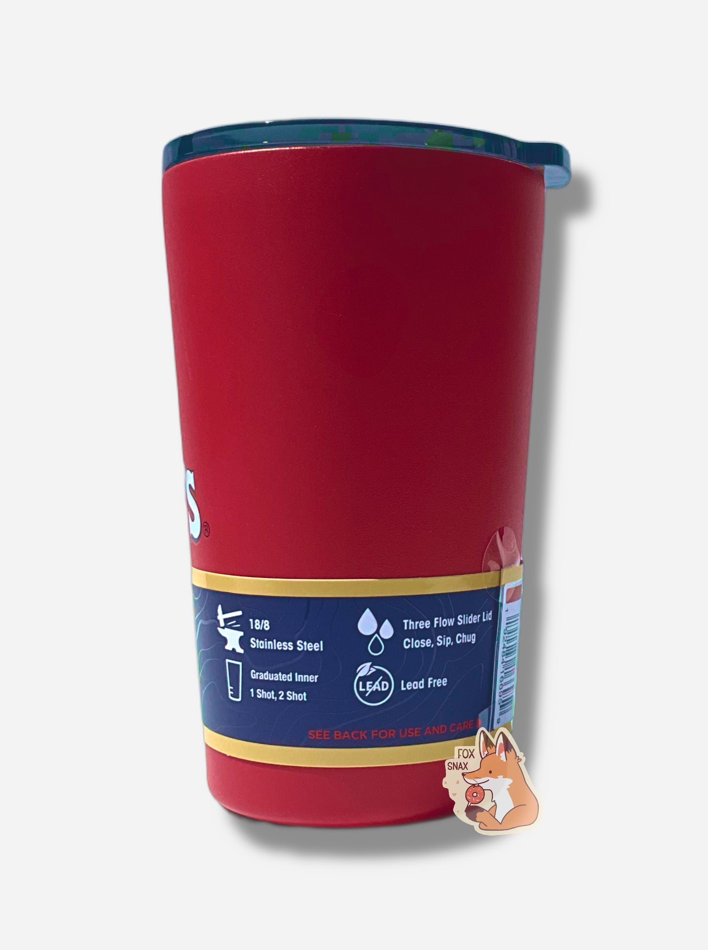 A picture of the back of a small 14oz tumbler.  The surface of the cup is red paint over metal.  The top of the cup features a black plastic lid.  The bottom surface is black plastic, and acts as a nice grippy surface so the cup doesn't slide around.