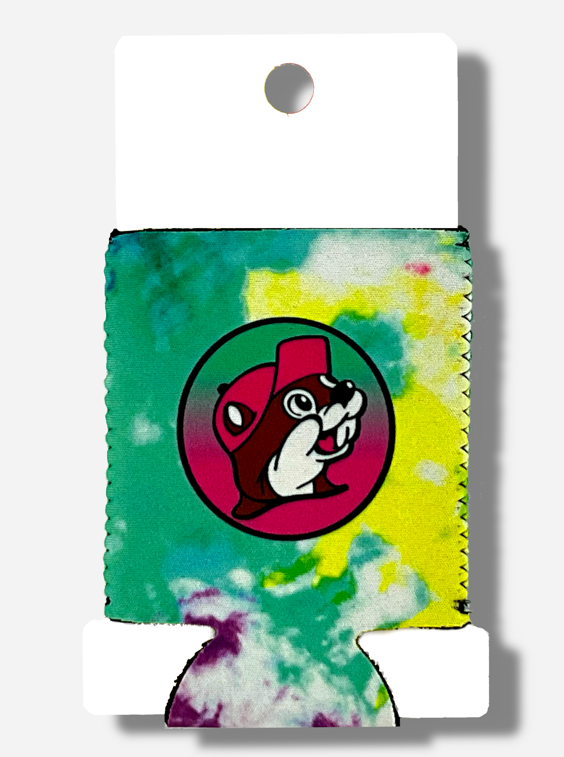 A picture of a foam and cloth tie dye Beverage Insulator, wrapped around a white piece of cardboard.  The back of the tie dye insulator is the same as the front, and has a picture of Buc-ee The Beaver on it, sillhoutted against a yellow circle with a black outline.