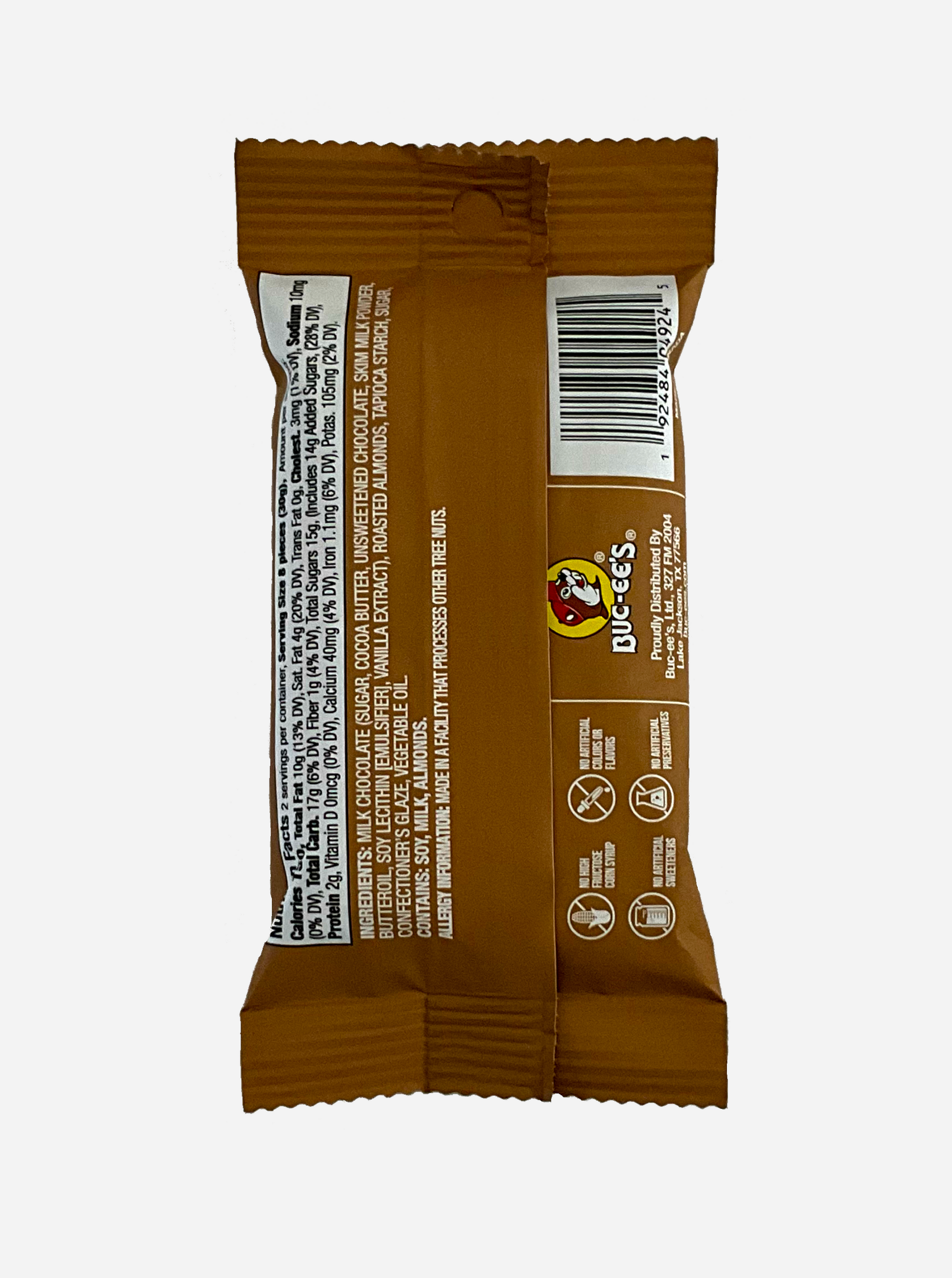 A picture of the back of a small package of Buc-ee's Milk Chocolate Almonds, 2 oz.  The bag is light brown.