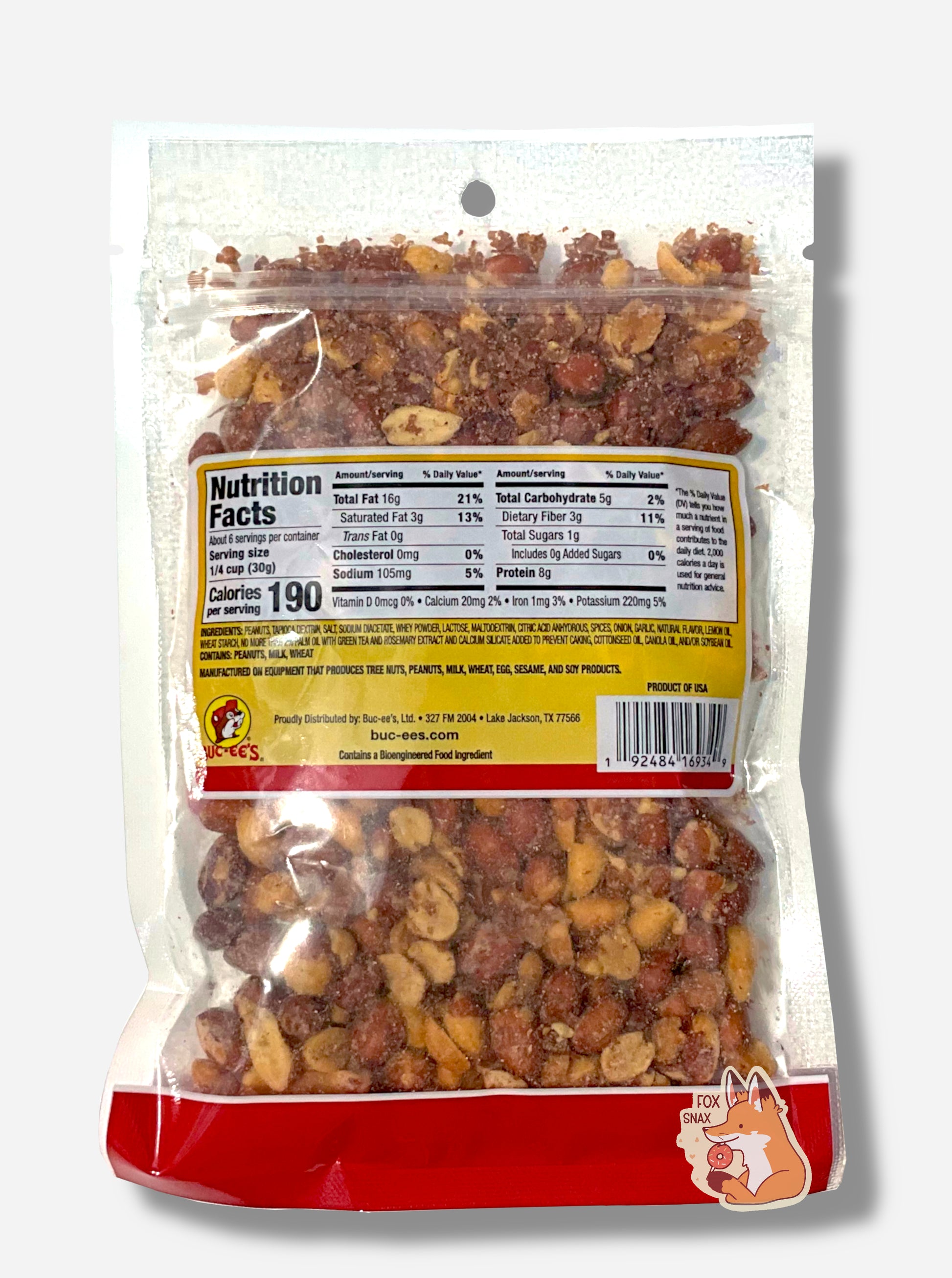 A picture of the back of a resealable bag of Buc-ee's Dill Pickle Southern Fried Peanuts, which are deep fried, shelled peanuts.  The peanuts inside are differing shades of brown and tan, and show a few grains of salt and dill flavoring on them or in the bag.  Nutrition facts, then ingredients are shown.