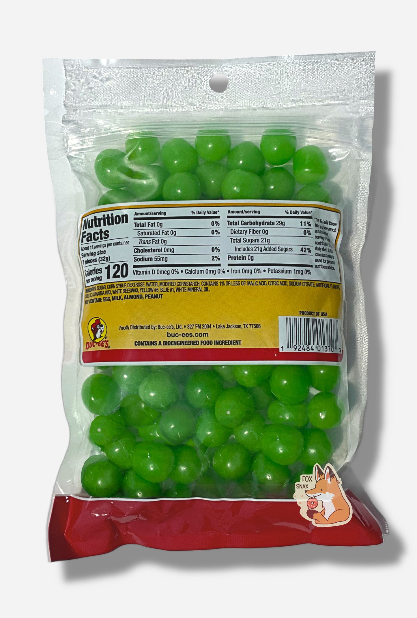 A picture of the back of a clear resealable bag of Buc-ee's Watermelon Sours, which are  bright green, sour and sweet spherical candies.  