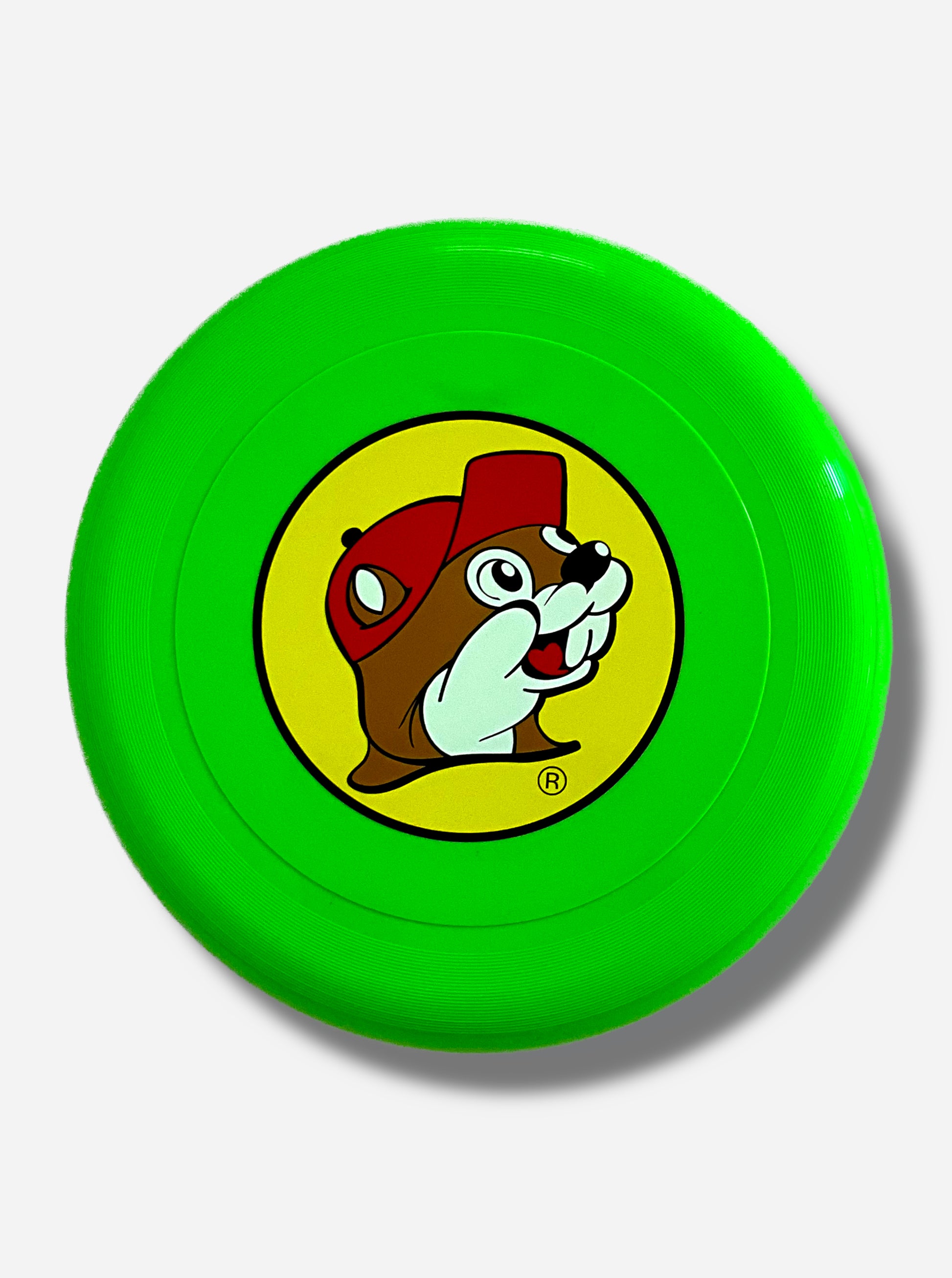 A picture of the top of a large, lime green flying disc toy.  In the center of the toy is a large circular picture of Buc-ee The Beaver, grinning, against a yellow background.  He is wearing a red ball cap.