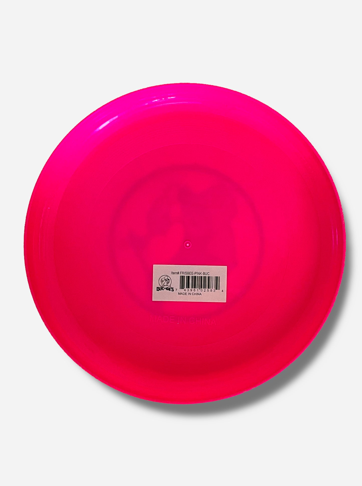 A picture of the back of a large, hot pink flying disc toy.  