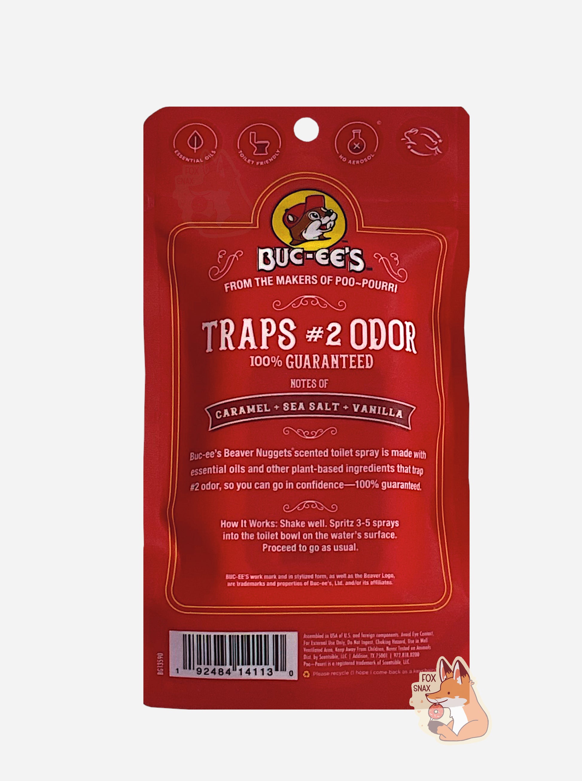 The back of a red package of Buc-ee's toilet spray on a white background.  The label reads BUC-EE'S, then FROM THE MAKERS OF POO~POURRI, then TRAPS #2 ODOR, 100% GUARANTEED, then NOTES OF CARAMEL & SEA SALT & VANILLA.