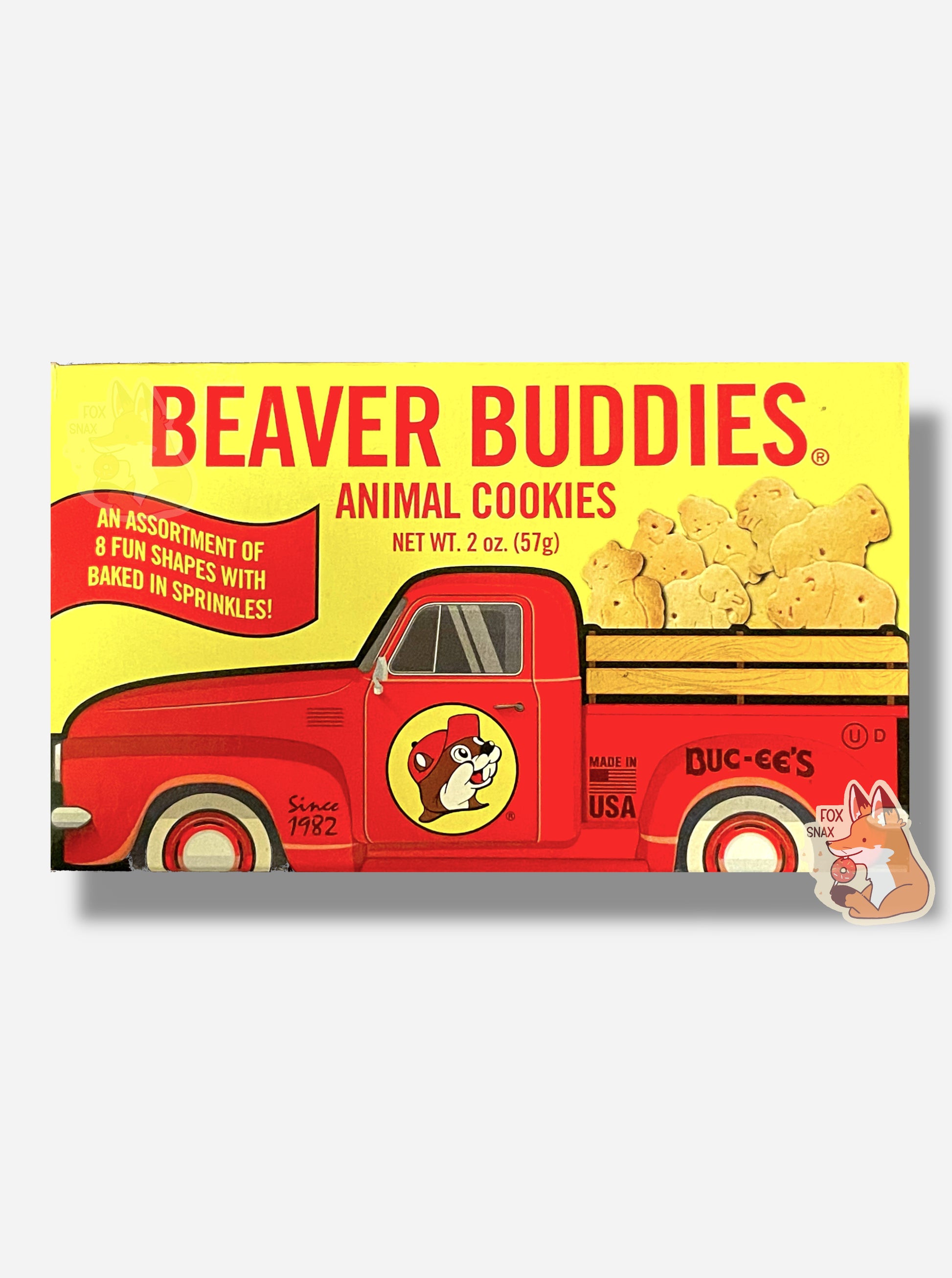 The back of a small rectangular cardboard package of Buc-ee's Beaver Buddies Animal Cookies.  The label has a picture of a red truck with the Buc-ee The Beaver logo on the door panel, and a series of animal cookies in the bed of the truck.  The text reads BEAVER BUDDIES ANIMAL COOKIES, NET WT 2 oz (57g).  AN ASSORTMENT OF 8 FUN SHAPES WITH BAKED IN SPRINKLES!  Made in the USA.