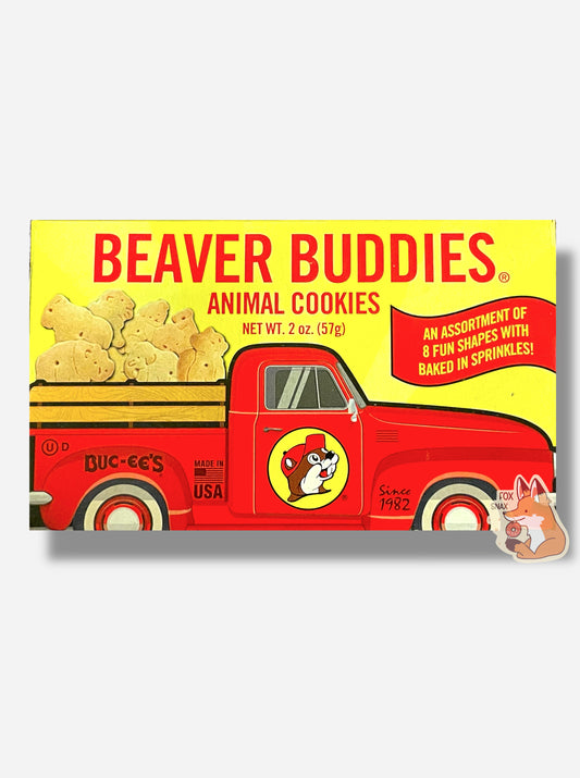 The front of a small rectangular cardboard package of Buc-ee's Beaver Buddies Animal Cookies.  The label has a picture of a red truck with the Buc-ee The Beaver logo on the door panel, and a series of animal cookies in the bed of the truck.  The text reads BEAVER BUDDIES ANIMAL COOKIES, NET WT 2 oz (57g).  AN ASSORTMENT OF 8 FUN SHAPES WITH BAKED IN SPRINKLES!  Made in the USA.