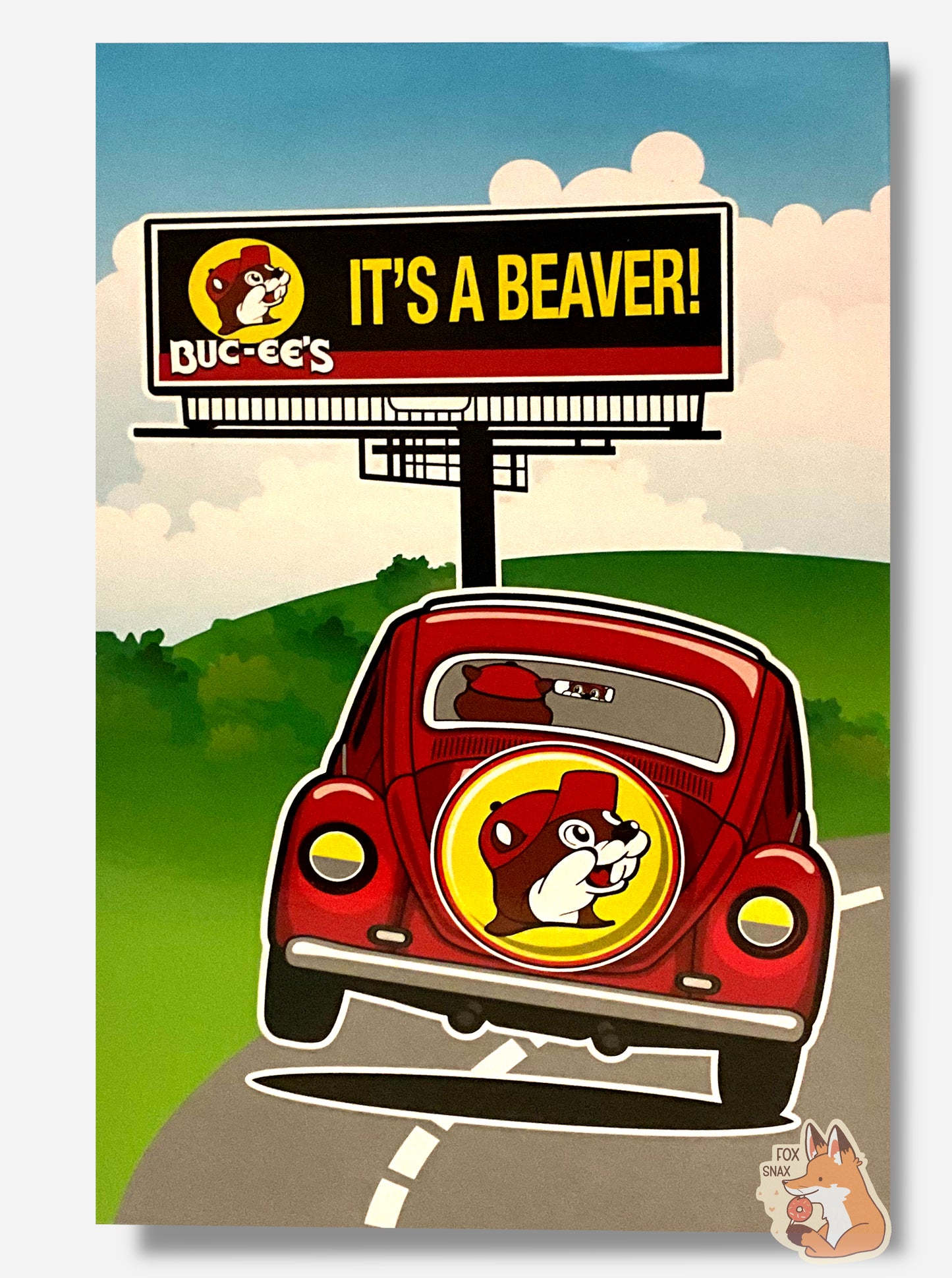 A picture of the left side of a box for a Buc-ee The Beaver Bobblehead.  It shows a cartoon of Buc-ee driving a red Volkswagon bug-esque red car along a road near a cartoon meadow.  In the distance among a blue sky and white clouds, a Buc-ee's billboard can be seen, stating IT'S A BEAVER!