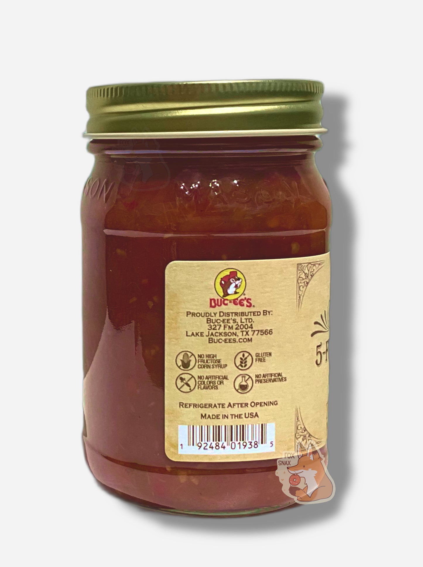 A picture of the left side of a glass jar of Buc-ee's 5-Fire Roasted Pepper  Salsa - the label is a "old-timey" sort of white/yellow with flared edges.  The middle reads No High Fructose Corn Syrup, No Artificial Colors Or Flavors, Gluten Free, No Artificial Preservatives. In the jar, reddish salsa can be seen.