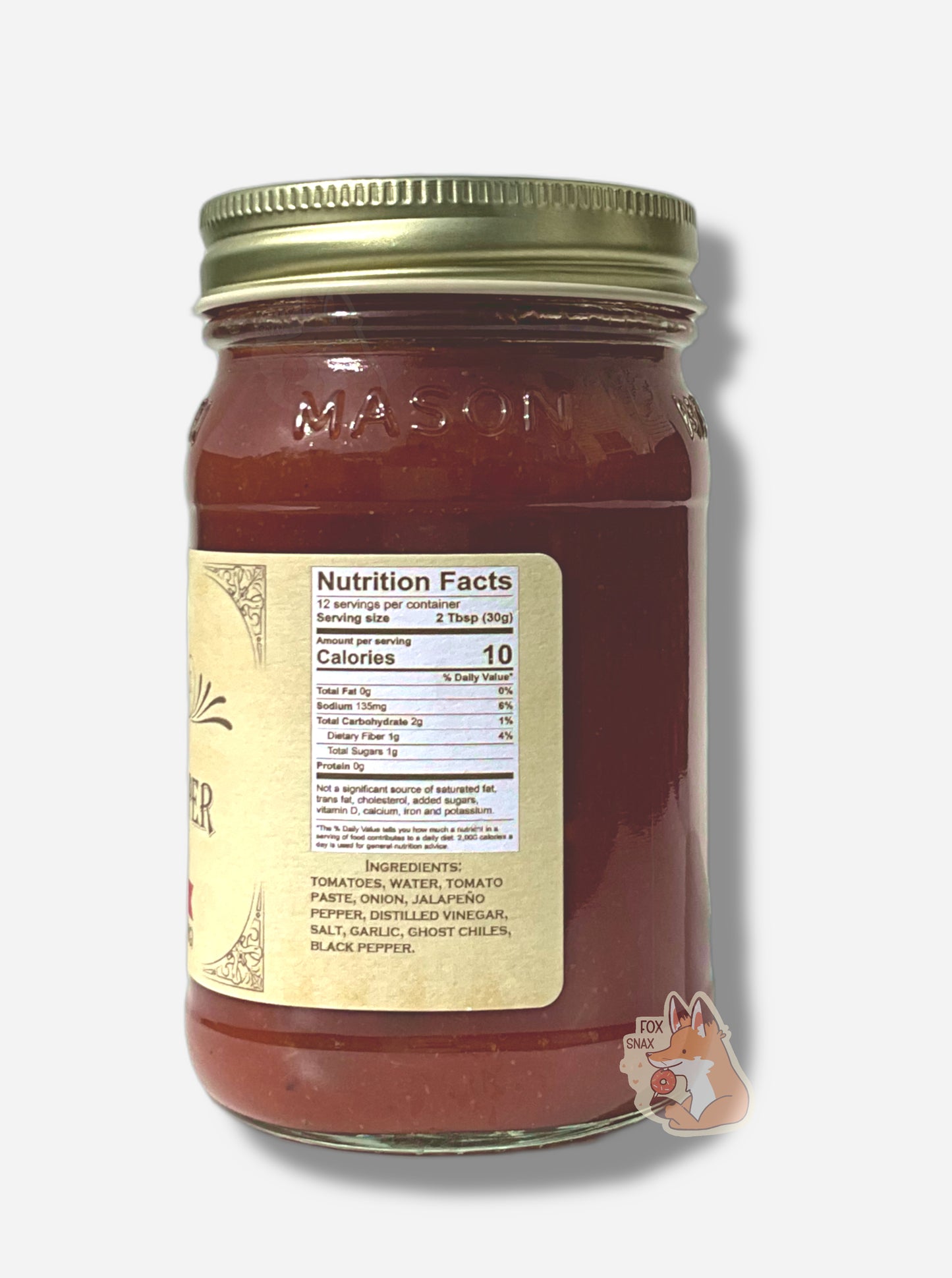 A picture of the right side of a glass jar of Buc-ee's Mango Pineapple Habanero -  the label is a "old-timey" sort of white/yellow with flared edges.  The middle reads Ingredients: Tomatoes, Mangoes, Pineapples, Onions, Brown Sugar, Water, Tomato Paste, Green Bell Peppers, Jalapeno Peppers, Distilled Vinegar, Salt, Habanero Peppers.