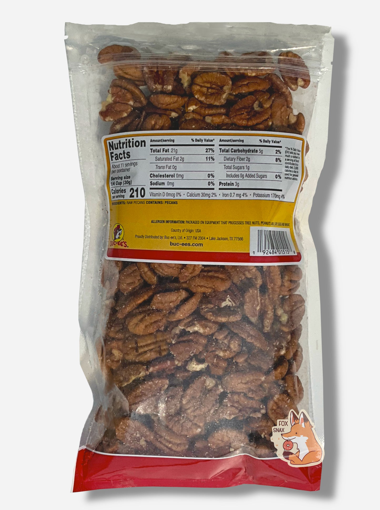 A picture of the back of a clear plastic bag of Buc-ee's Mammoth Pecans.  Inside the bag are a large number of brown dried pecans.