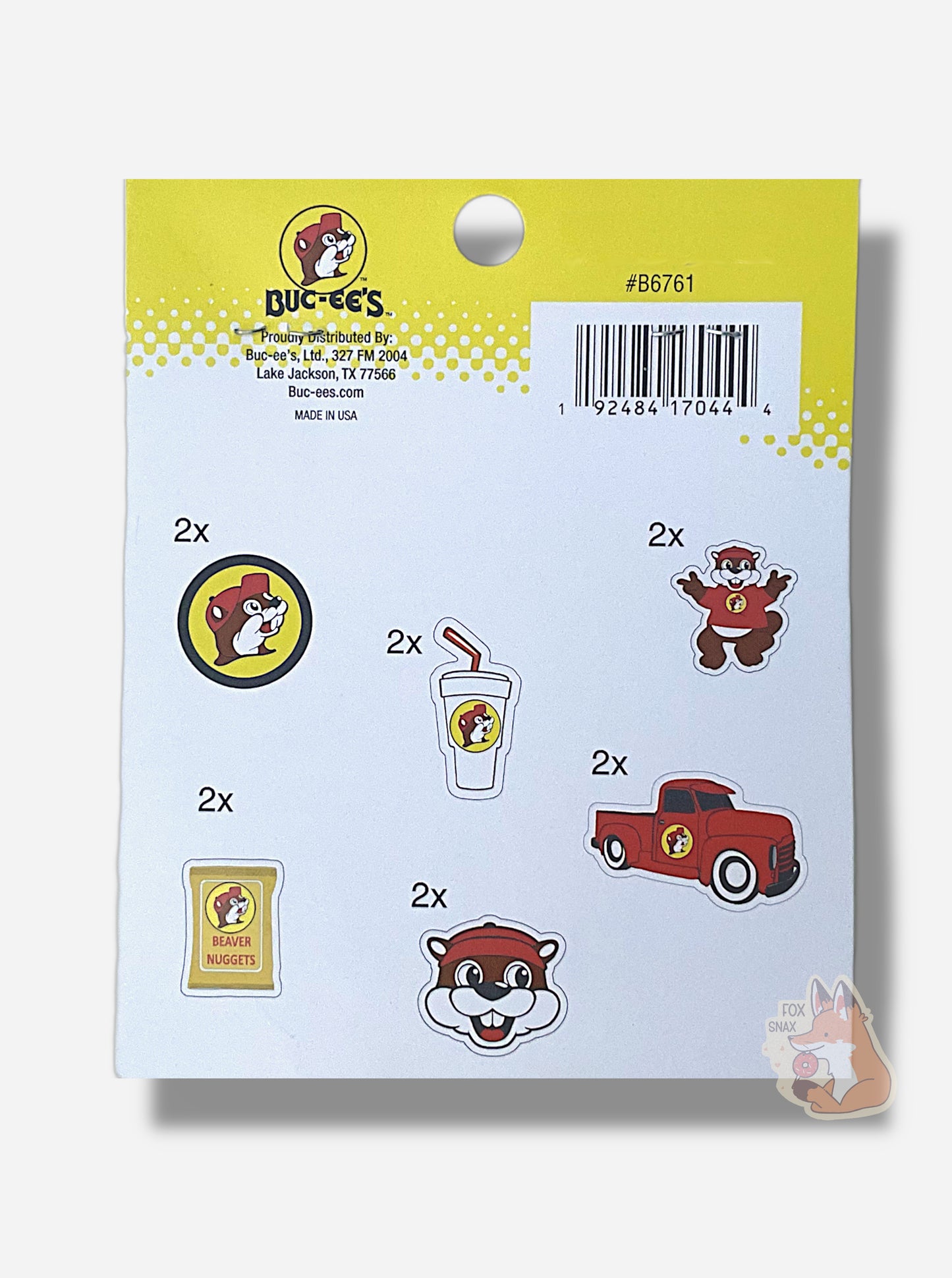 A picture of the front of Buc-ee's Nugget And Drink Sticker Pack.  The cardboard label indicates there are 12 stickers inside:

(2) Buc-ee's logo stickers
(2) Beaver Nugget stickers
(2) Giant Buc-ee Head stickers
(2) Drink Cup Stickers
(2) Red Truck Stickers
(2) Buc-ee Peace Sign Stickers