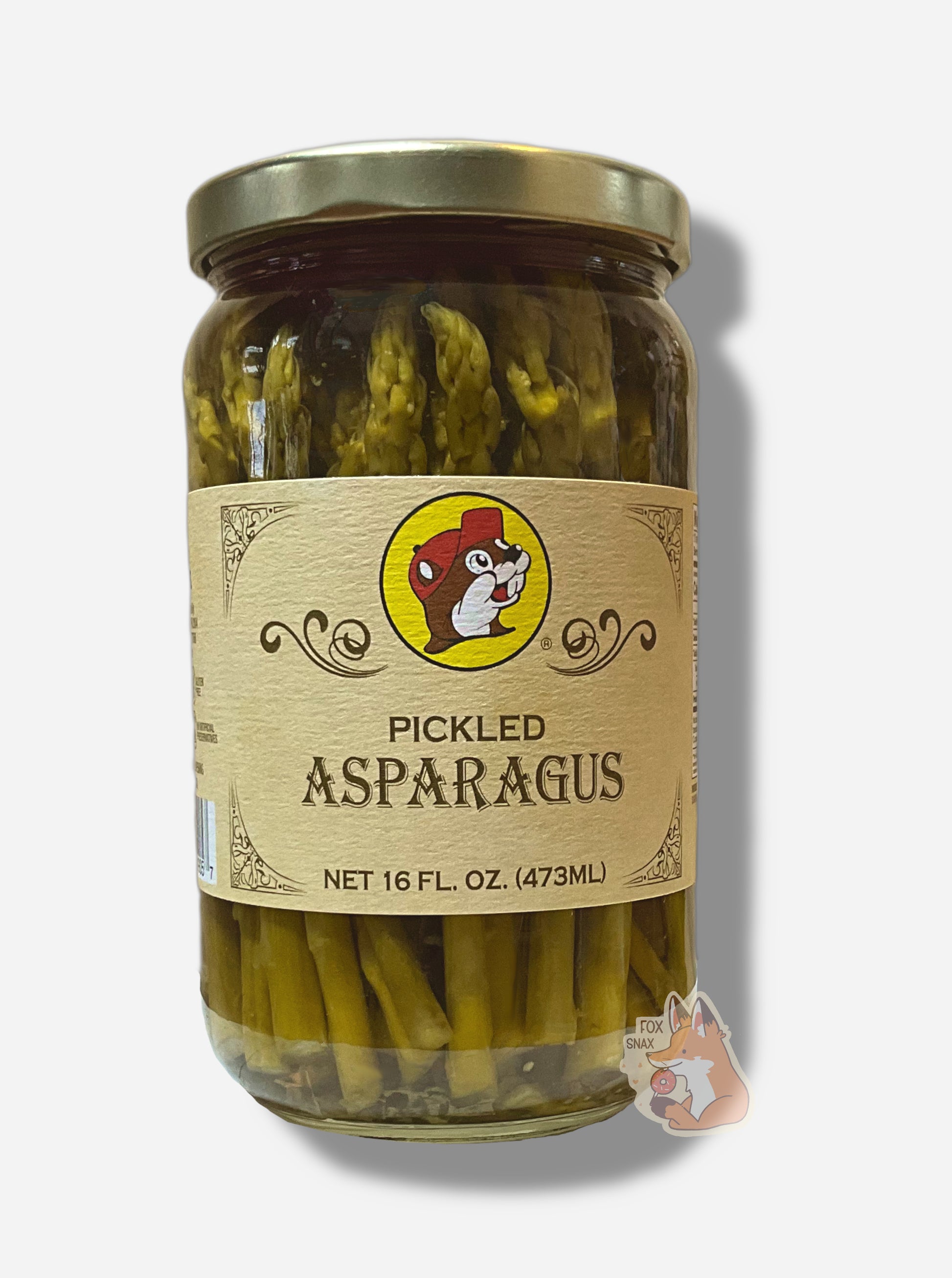 A picture of the front of a glass jar of Buc-ee's Pickled Asparagus - the label is a "old-timey" sort of white/yellow with flared edges.  The middle has a giant Buc-ee the Beaver logo on it.  In the jar, long dark asparagus spears can be seen.